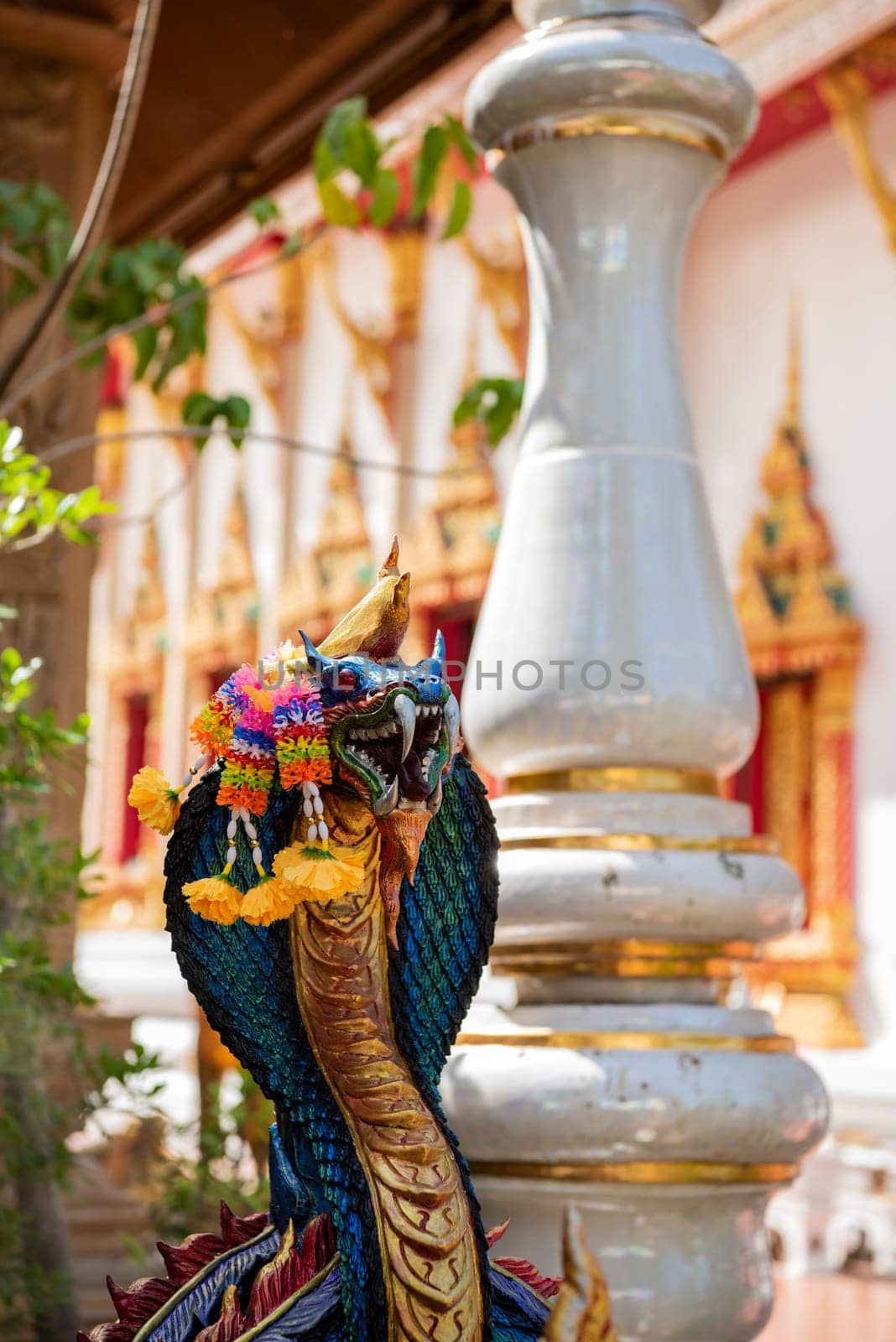 cobra figure at Wat Maha Wanaram in the city Udon Ratchathani and Province Ubon Ratchathani in Thailand.  Thailand, Ubon Ratchathani, November, 23, 2023