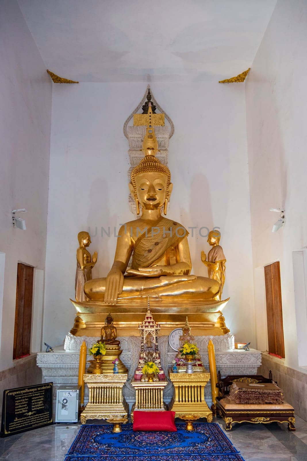 Buddha inside of Wat Luang in the city Udon Ratchathani and Province Ubon Ratchathani in Thailand.  Thailand, Ubon Ratchathani, November, 23, 2023
