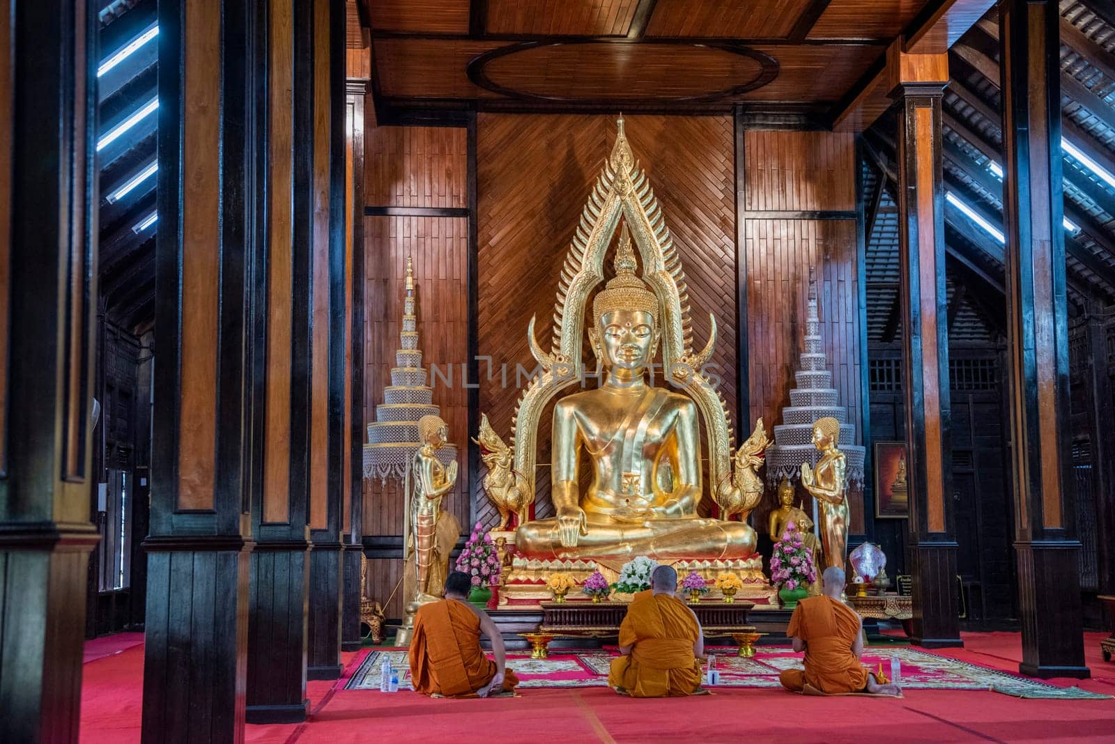 Buddha inside of Wat Luang in the city Udon Ratchathani and Province Ubon Ratchathani in Thailand.  Thailand, Ubon Ratchathani, November, 23, 2023