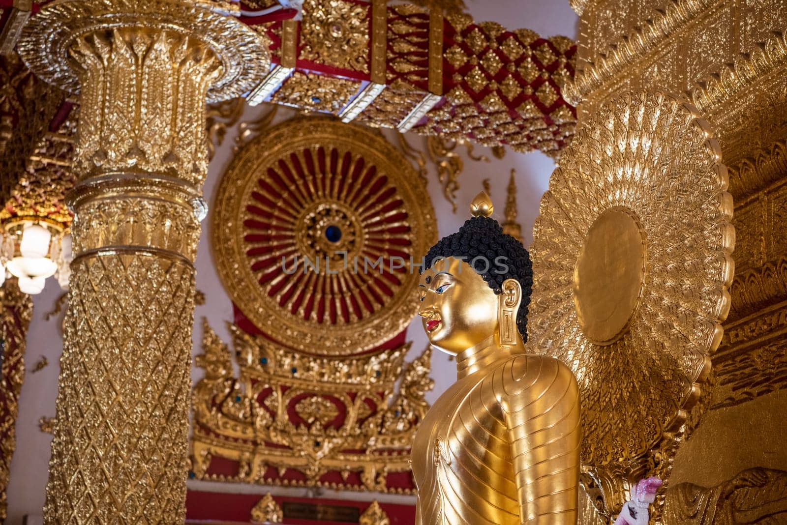 Buddha inside the Sri Maha Pho Chedi of Wat Phra That Nong Bua Temple in city centre and Province Ubon Ratchathani in Thailand.  Thailand, Ubon Ratchathani, November, 24, 2023