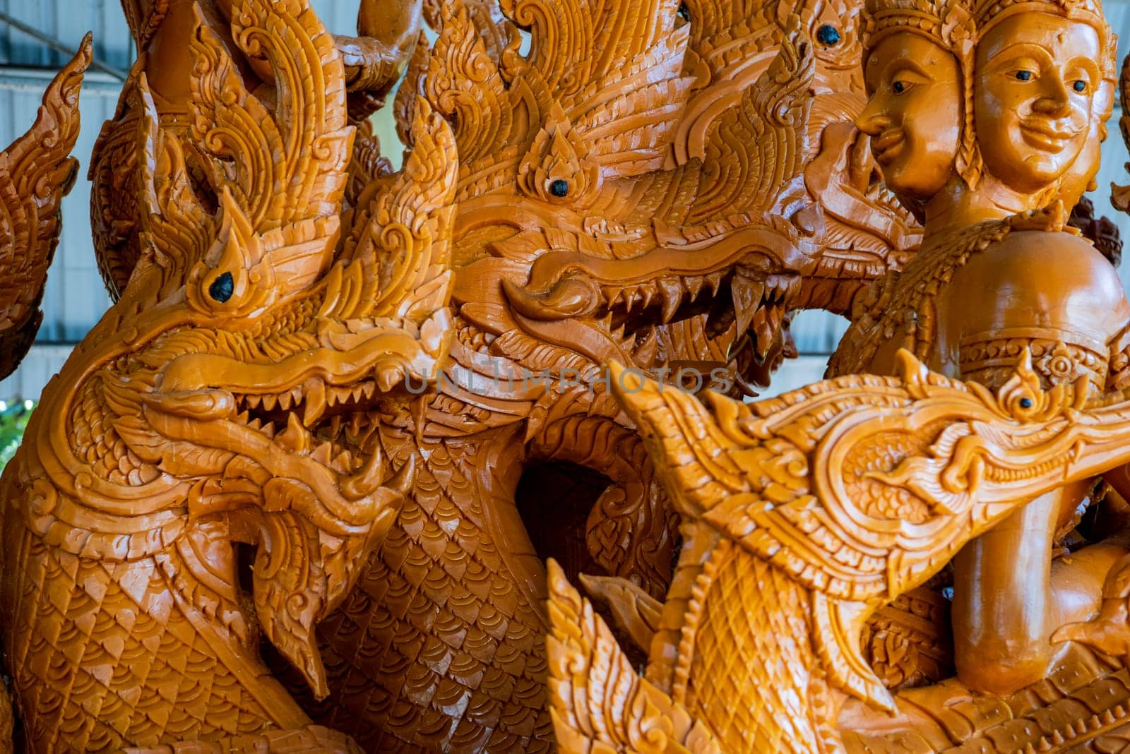 a detail of a real carve Wax candle of the Wax Candle Festival in city centre of Udon Ratchathani and Province Ubon Ratchathani in Thailand.  Thailand, Ubon Ratchathani, November, 24, 2023
