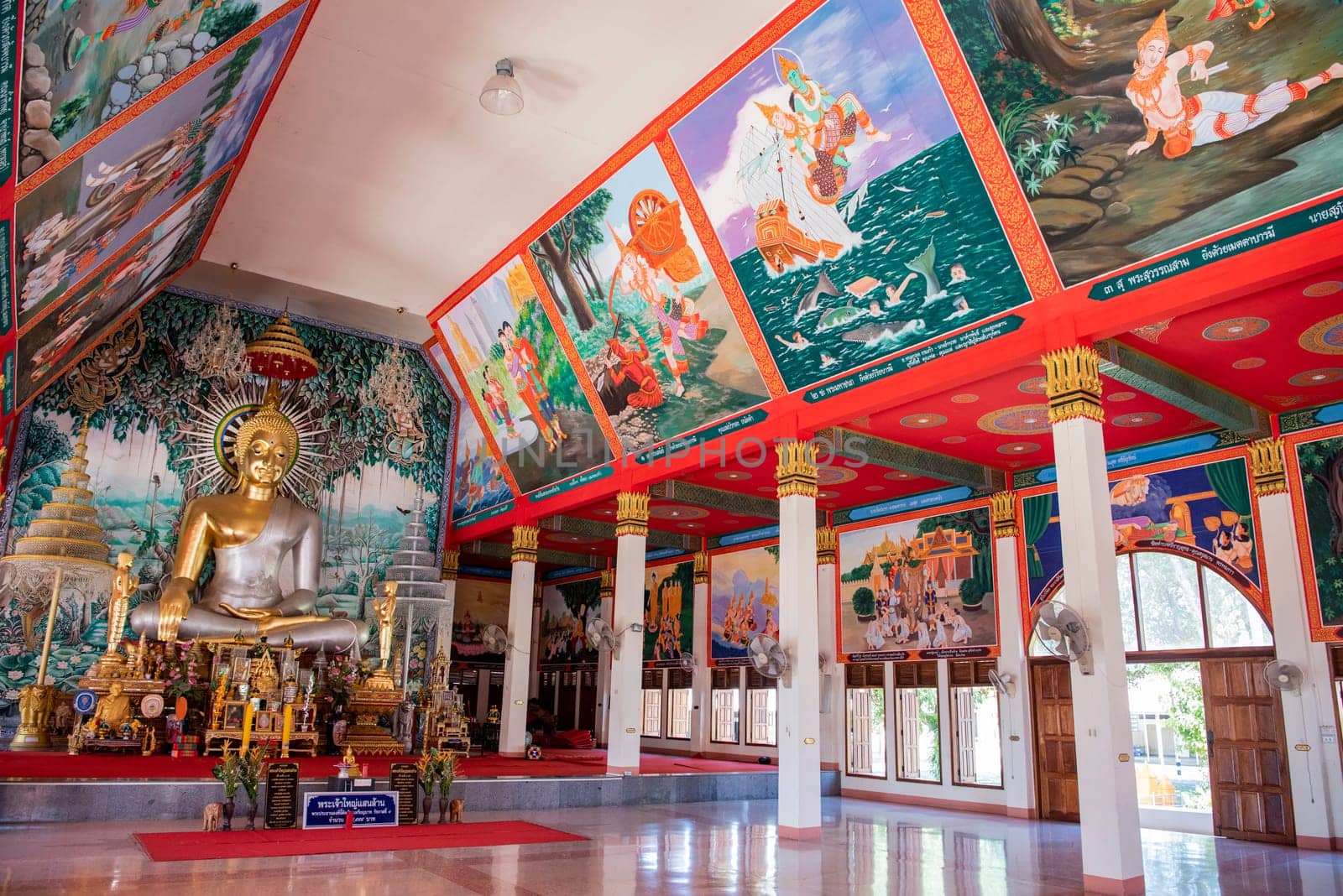 a Buddha inside of Wat Ban Na Kwai in city centre and Province Ubon Ratchathani in Thailand.  Thailand, Ubon Ratchathani, November, 24, 2023