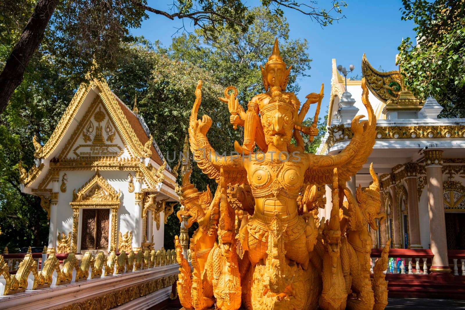 Golden Buddha story statue, like to carve Wax candle at Wat Phra That Nong Bua Temple in city centre of Udon Ratchathani and Province Ubon Ratchathani in Thailand.  Thailand, Ubon Ratchathani, November, 24, 2023