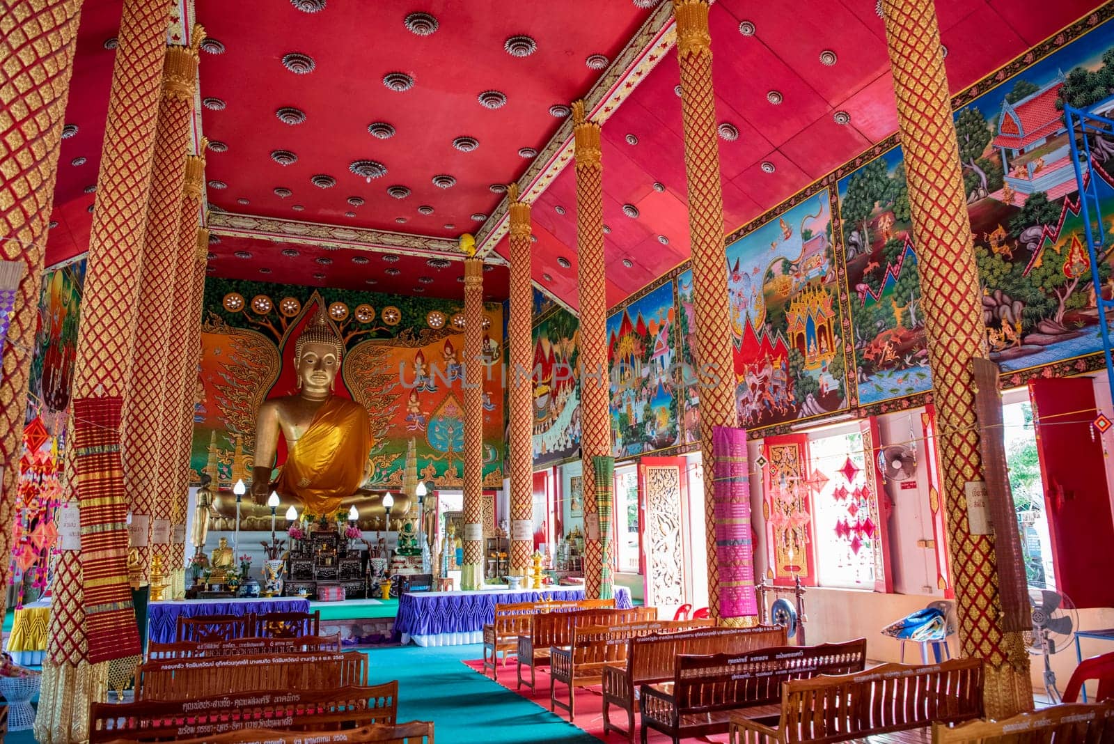 Buddha inside of the Wat Jaeng in the city centre of Udon Ratchathani and Province Ubon Ratchathani in Thailand.  Thailand, Ubon Ratchathani, November, 25, 2023