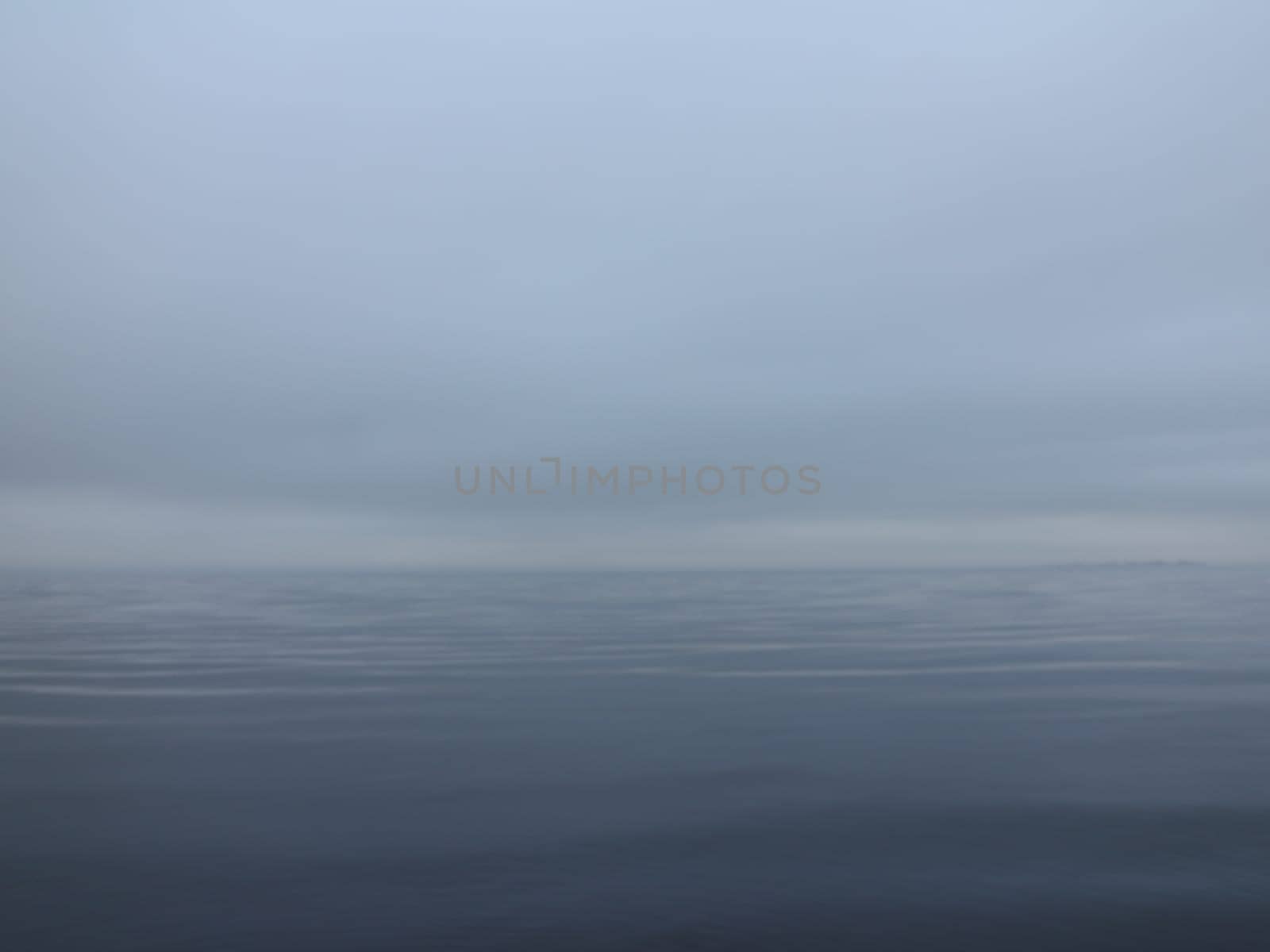 thick white fog over a calm sea, calm, silence, nothing visible, gradient background