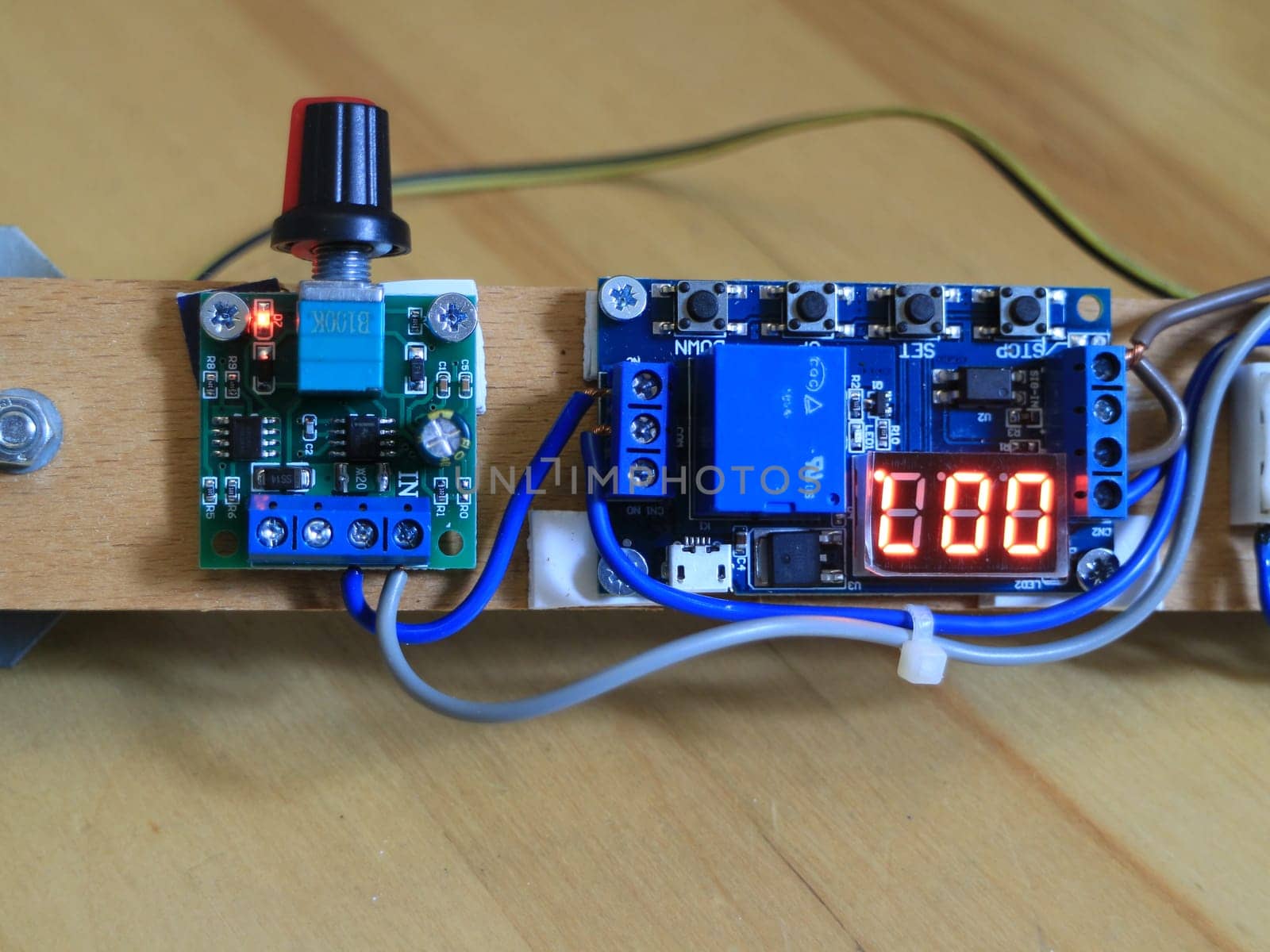 electronic actuators variable resistor and mechanical relay with timer close-up