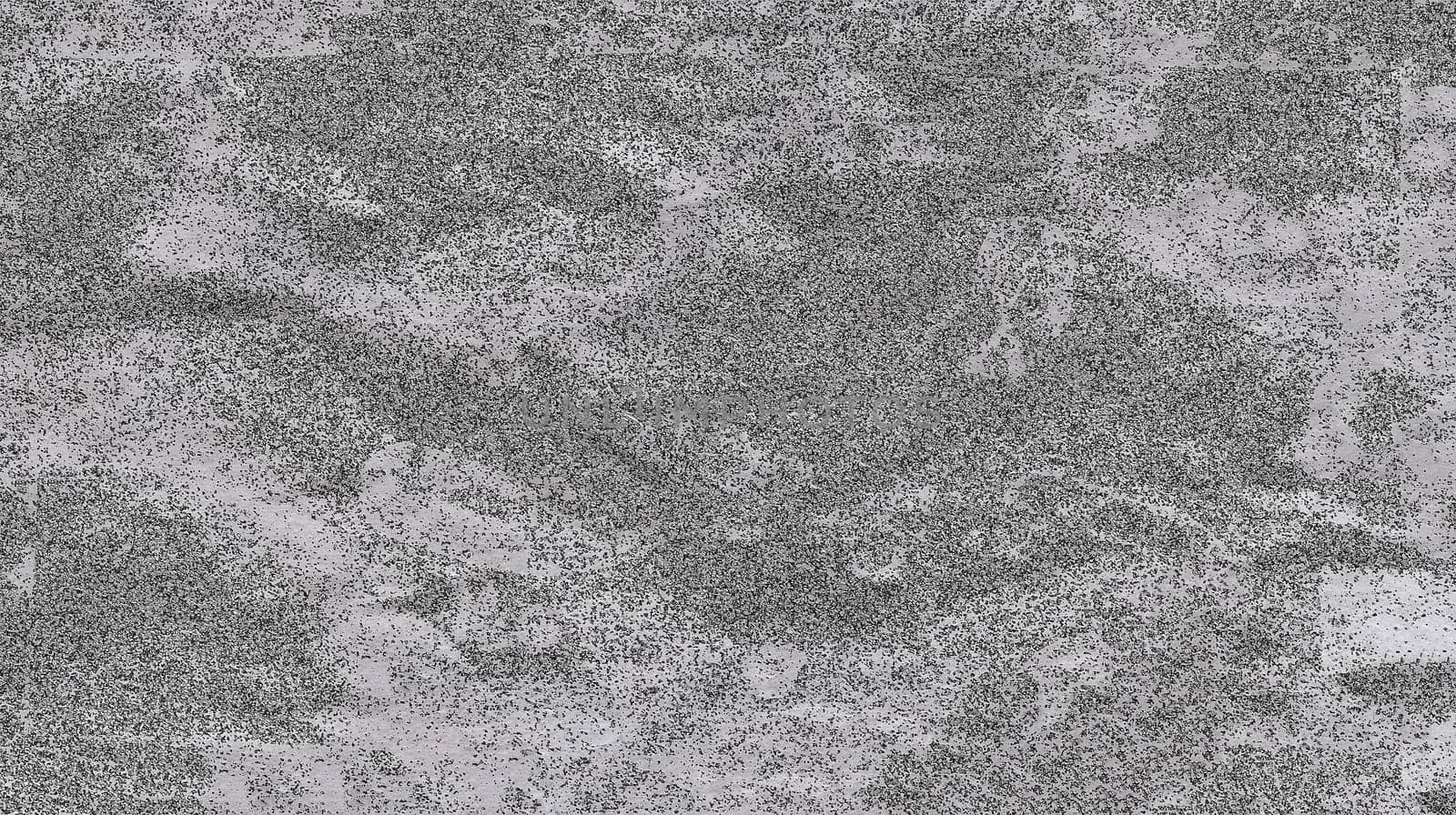 Rough mottled gray surface close-up