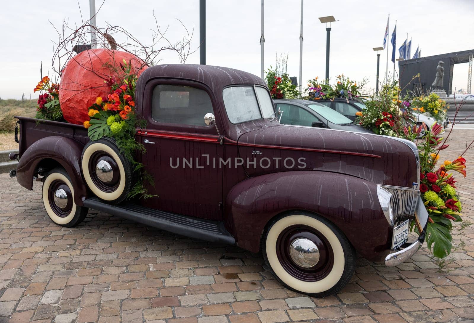 Noordwijk, Netherlands - April 22, 2023: Cars decorated with flowers taking part in the Bloemencorso Bollenstreek the annual spring flower parade from Noordwijk to Haarlem in the Netherlands.