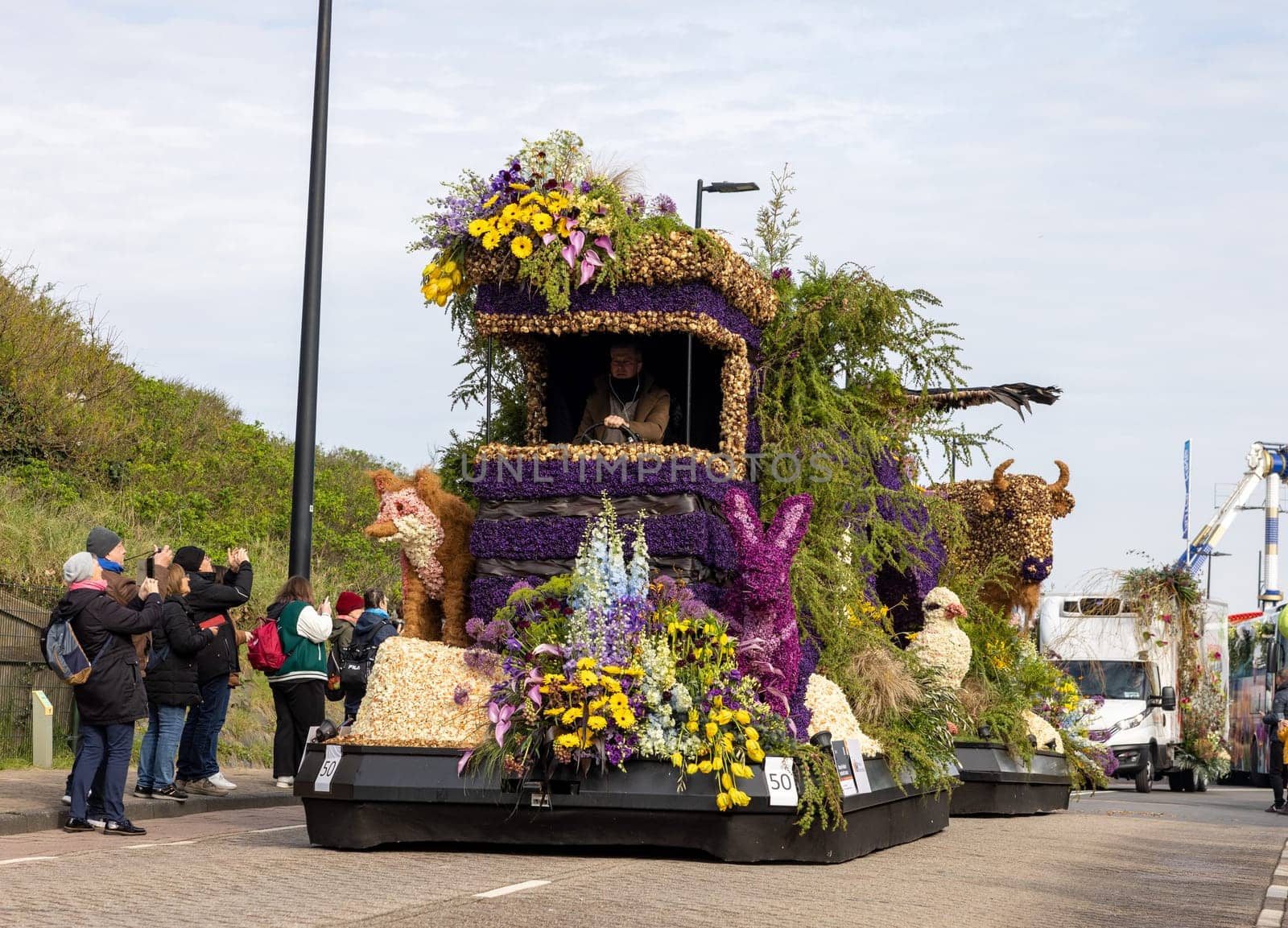 Noordwijk, Netherlands - April 22, 2023: Spectacular flower covered floats in the Bloemencorso Bollenstreek the annual spring flower parade from Noordwijk to Haarlem in the Netherlands.