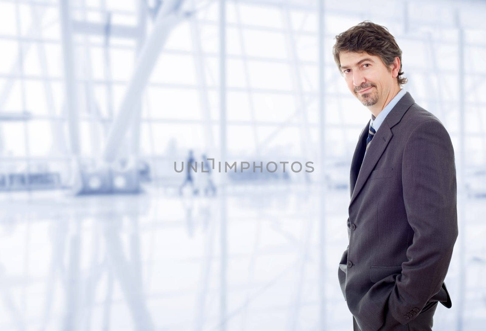 young business man portrait at the office
