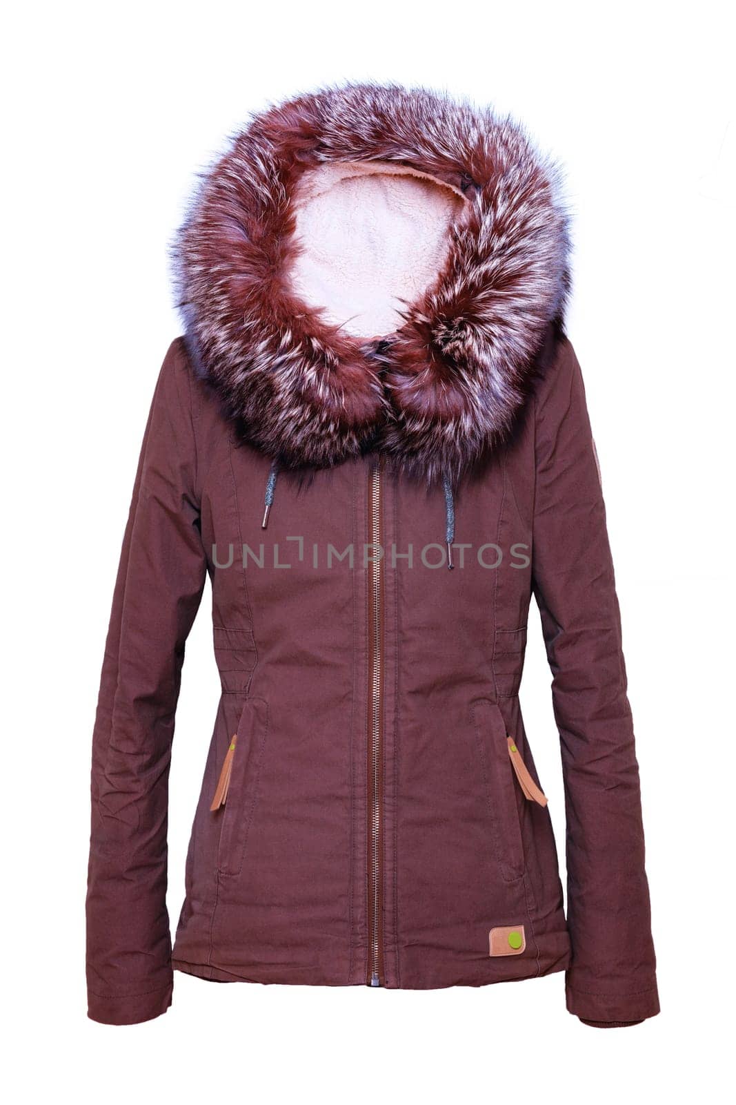 Woman clothes. Stylish brown female winter jacket with fur hood on mannequin isolated on a white background. Girls winter fashion.