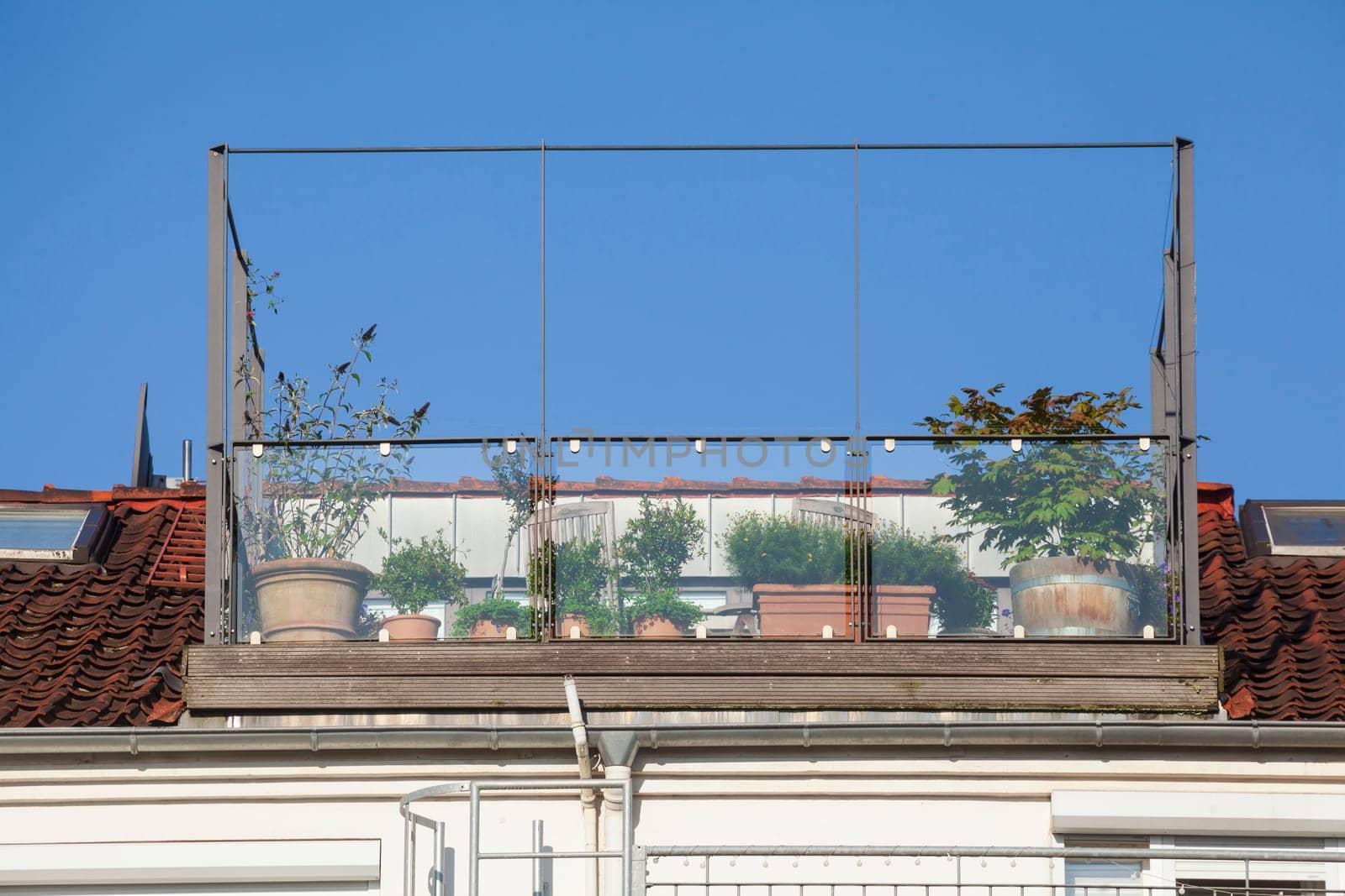 Roof garden with balcony and flower pots, Bremen, Germany, Europe