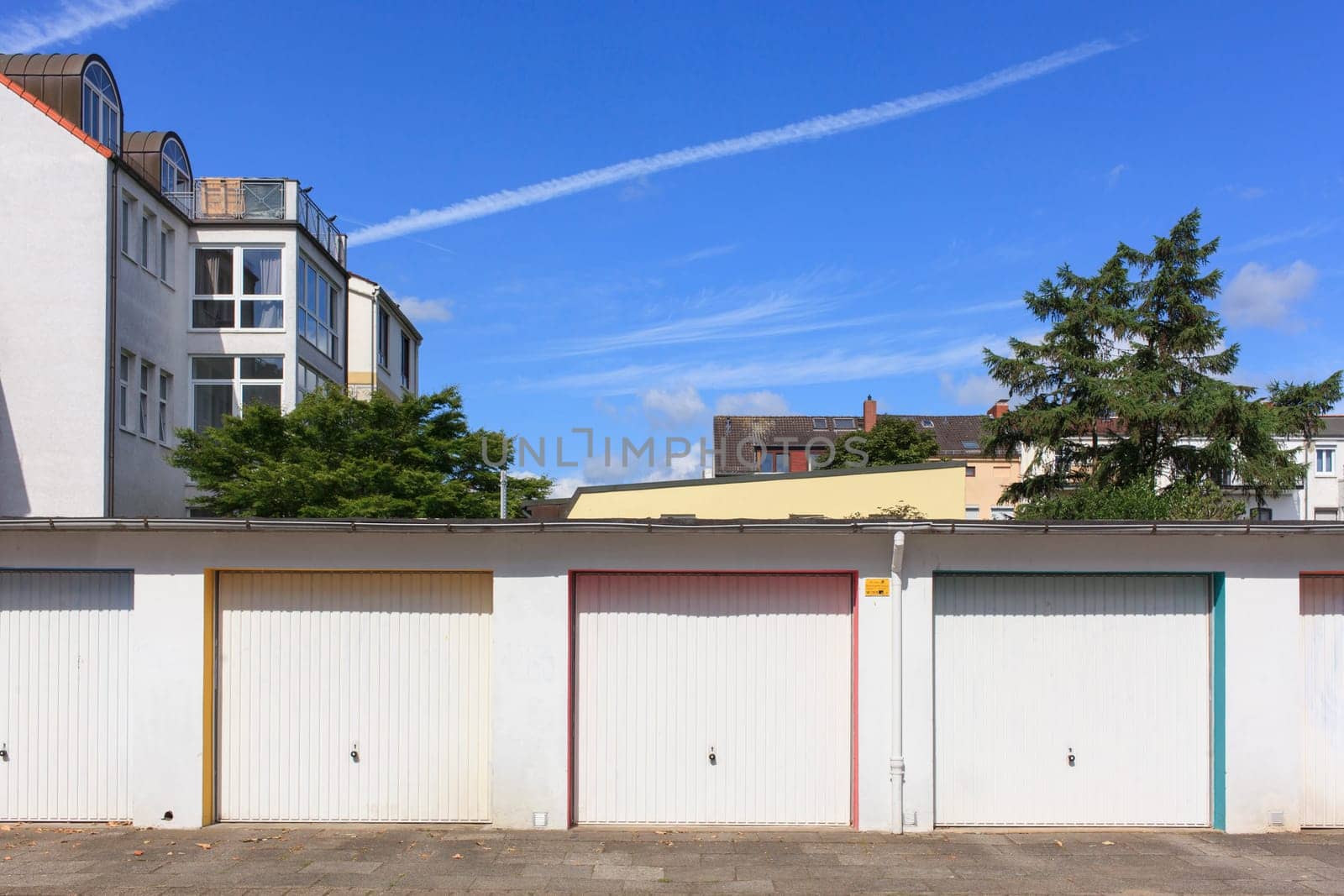 Colorful garages with residential buildings, Bremen, Germany