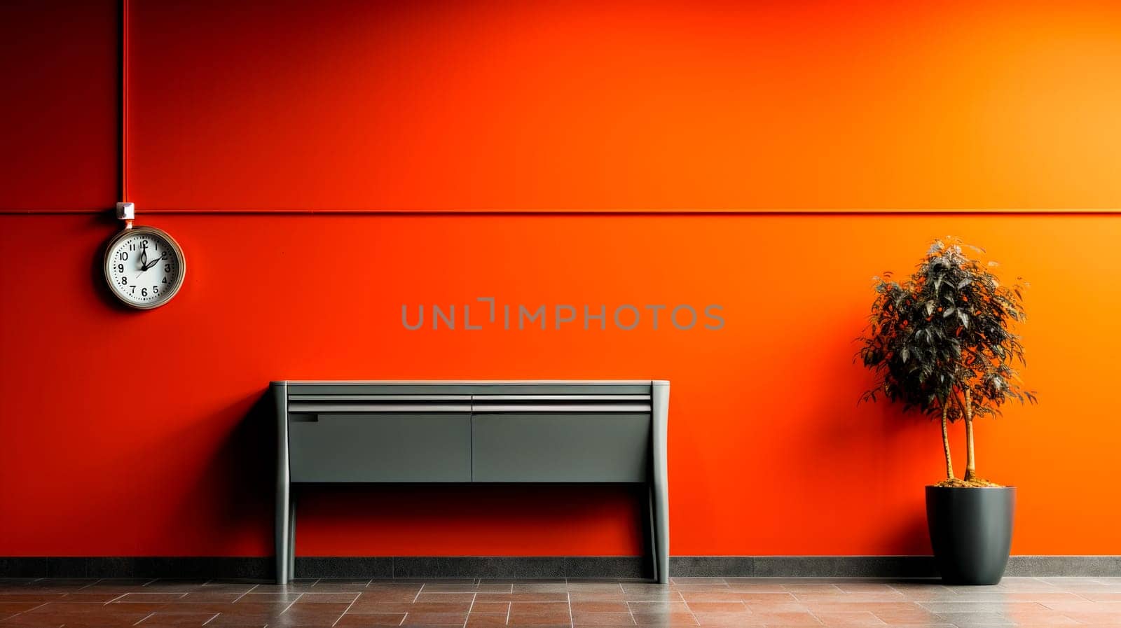 A sleek console table, round wall clock, and potted plant against a bold orange wall, highlighting simple elegance.