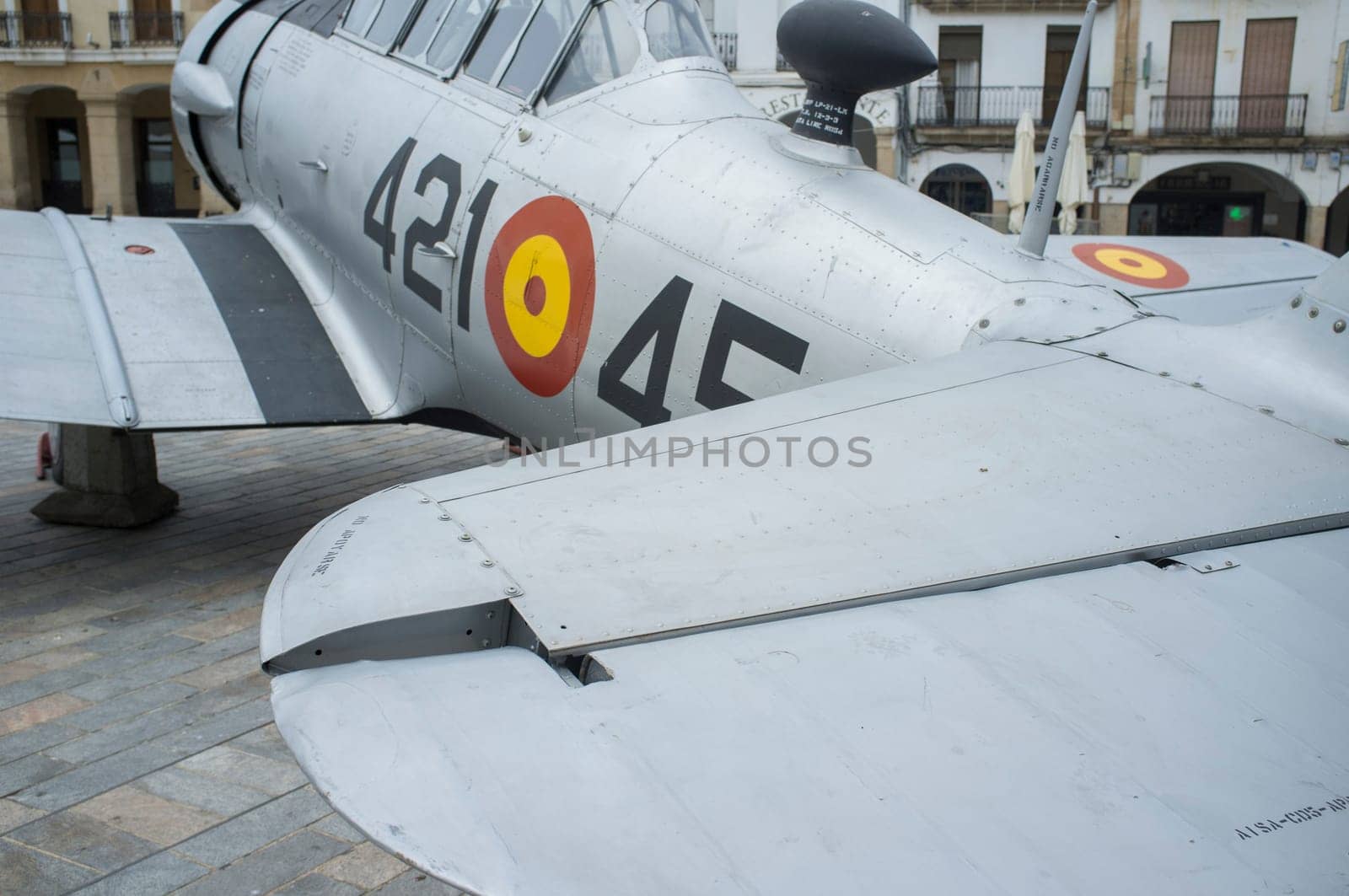 Caceres, Spain - May 27th, 2021: North American Aviation T-6 Texan. Spanish military aviation exhibition. Caceres main square, Spain
