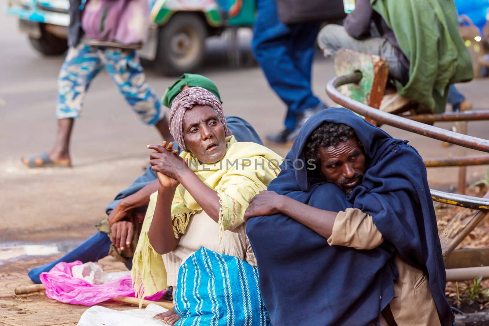 Bahir Dar, Ethiopia - April 21st, 2019: Beggar woman on the street during Easter holidays. April 21th. 2019, Bahir Dar, Etiopia