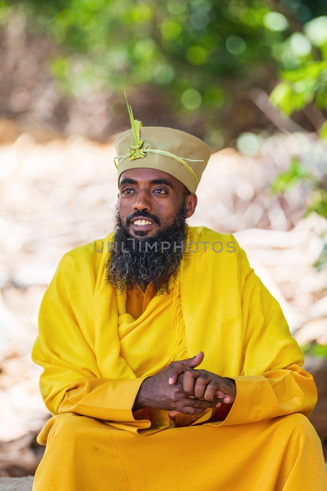 Bahir Dar, Ethiopia - April 21, 2019: Orthodox monk serving worship in Tana Haik Entons Eysus United Monastery on lake Tana near Bahir Dar. Ethiopia Africa