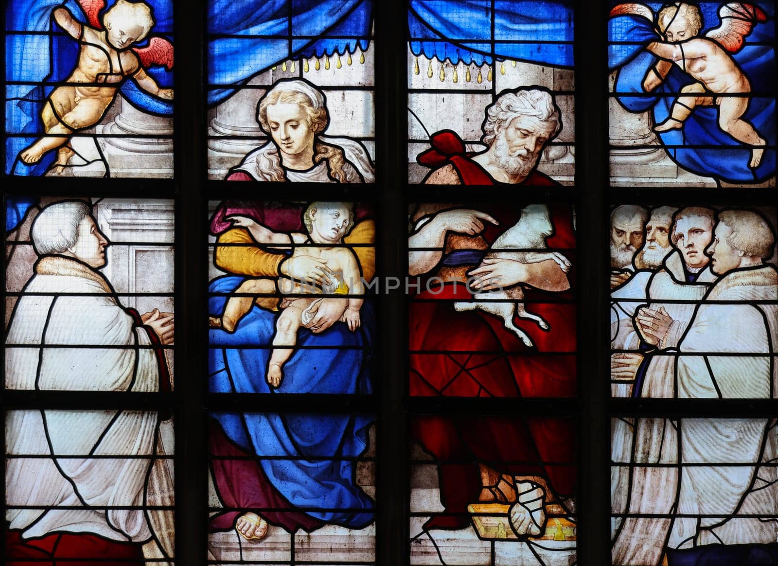 Gouda, the Nehterlands - April 20, 2023: The Stained glass number 11 - Birth of John the Baptist by Lambert van Noort  in the Sint Janskerk