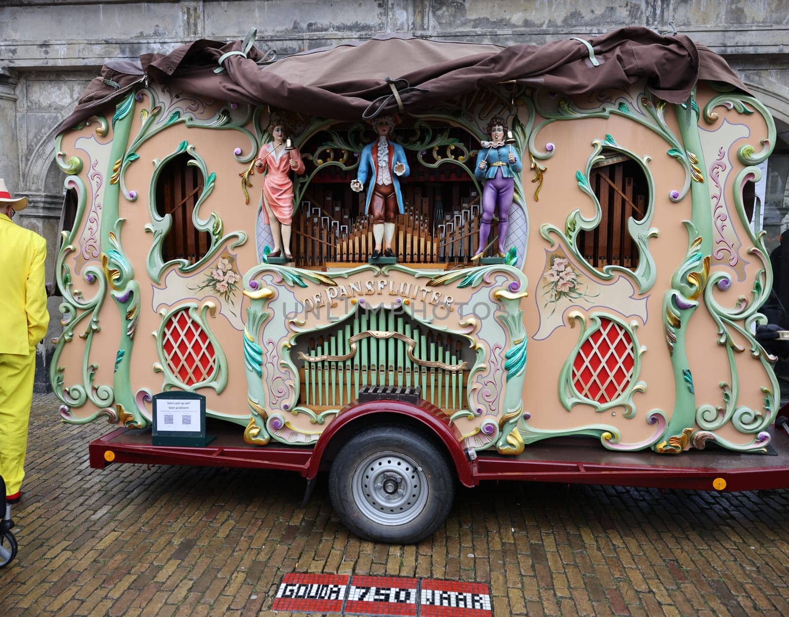 Gouda, the Nehterlands - April 20, 2023: Traditional Dutch street barrel organ named the Pansfluiter at cheese market in Gouda, the Nehterlands