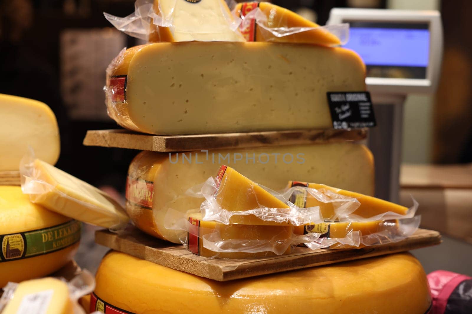 Gouda, the Nehterlands - April 20, 2023: Display of traditional Dutch cheese at local cheese shop in Gouda, the Netherlands