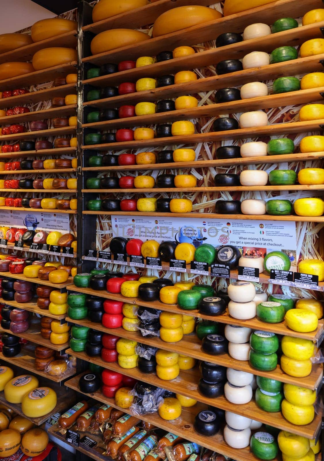 Gouda, the Nehterlands - April 20, 2023: Display of traditional Dutch cheese at local cheese shop in Gouda, the Netherlands
