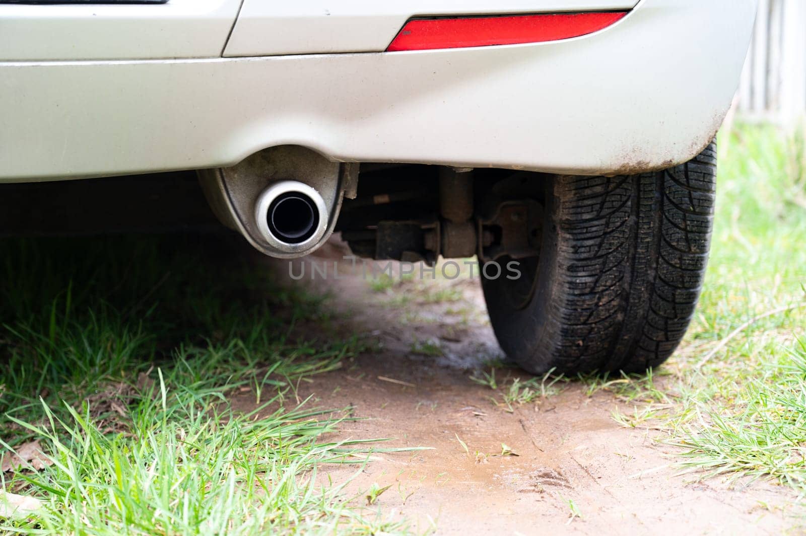 Exhaust of a car, CO2 emission, air pollution, global warming and climate change, reduce carbon footprint, environment protection, lifestyle