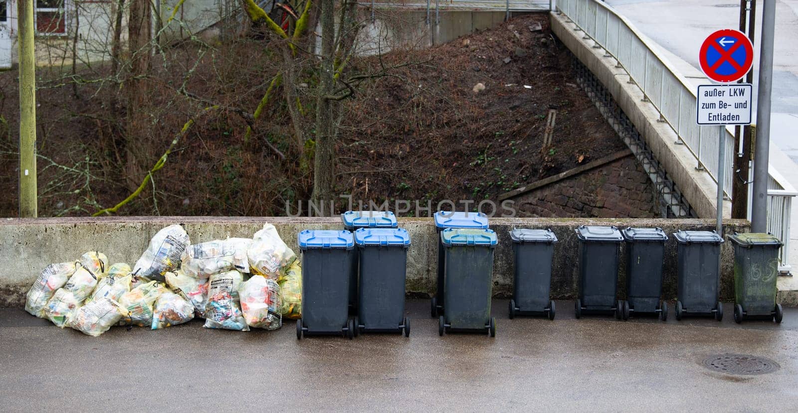 Pile of waste plastic trash bags and bins in Germany, garbage collection, environment and pollution concept, Trier, 13.03.2024