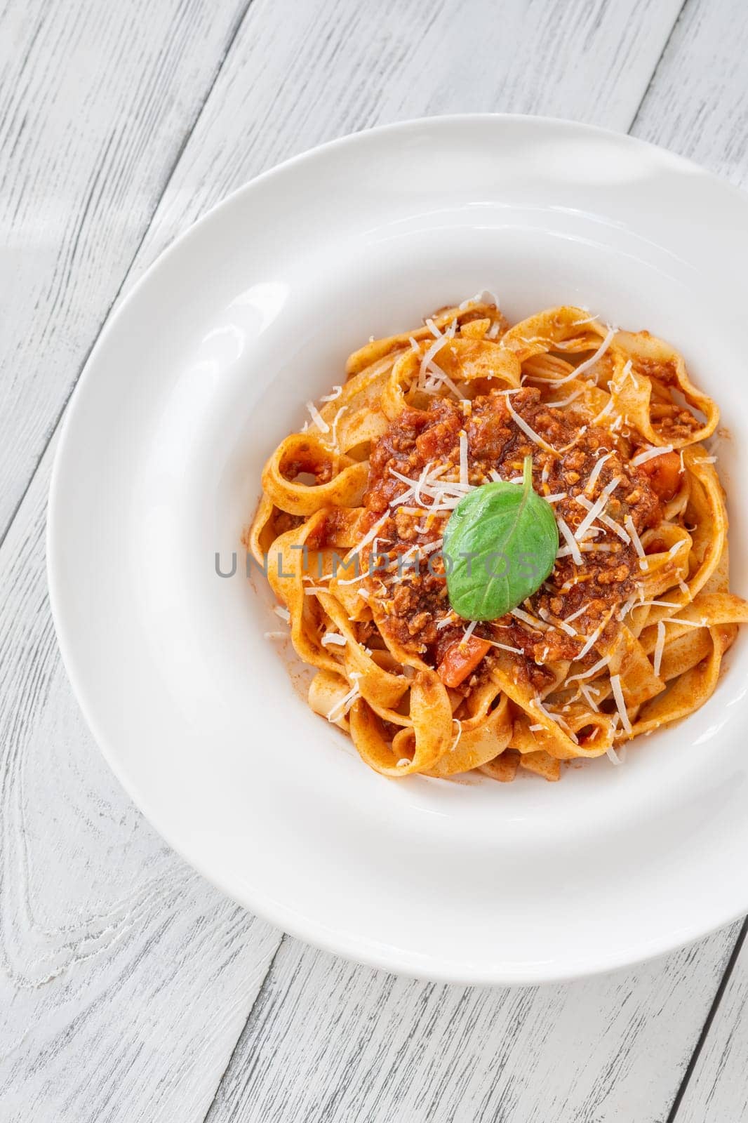 Portion of Tagliatelle pasta with bolognese sauce
