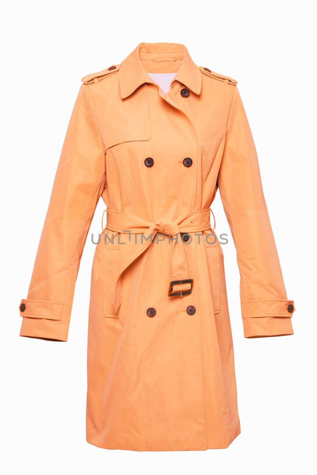 Woman coat isolated. A luxurious and stylish elegant female orange yellow  trenchcoat on mannequin isolated on a white background. Trench coat for spring and summer fashion.
