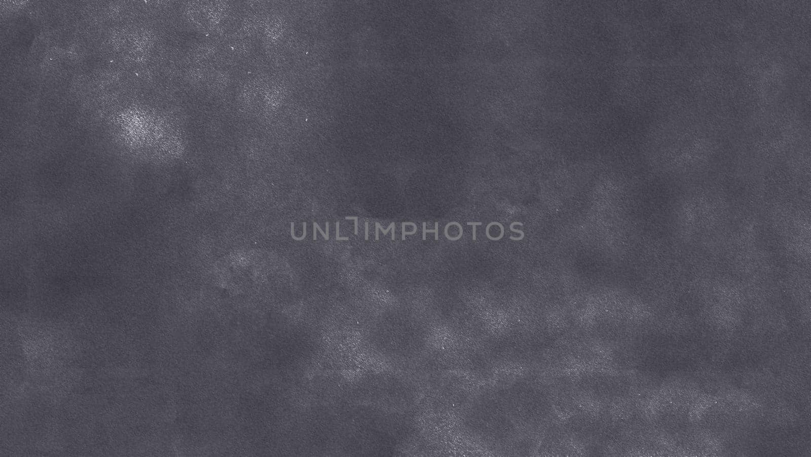 The background texture is a gray surface with white dots and highlights in close-up