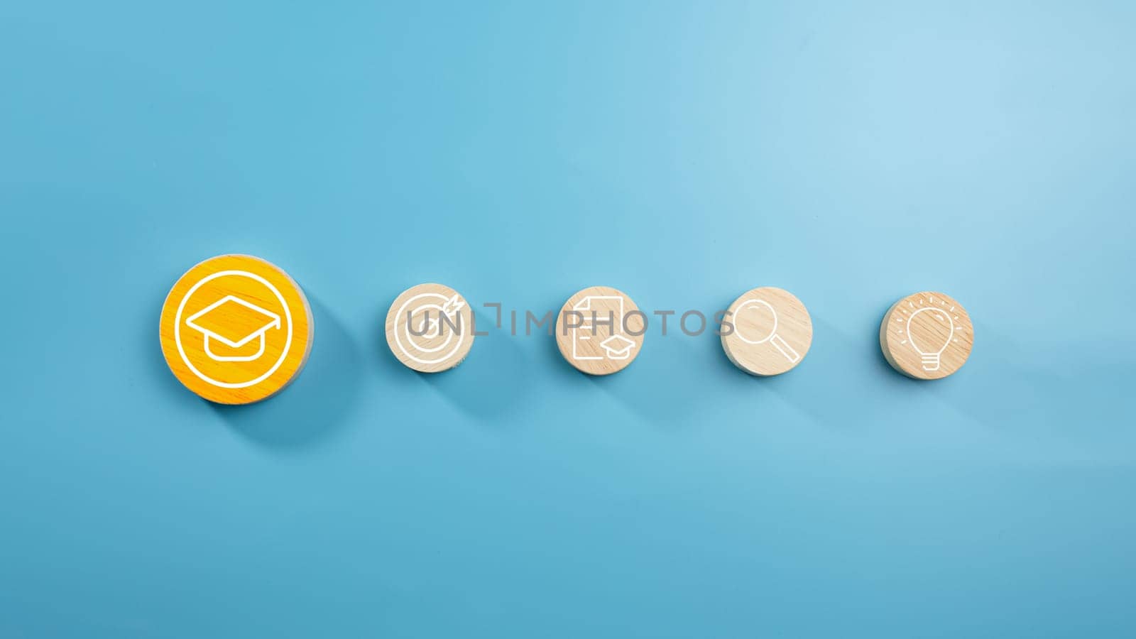 Circular wooden board with graduation and education symbols linked with each other with lines, Success and necessary skills in graduation or education, Knowledge and teaching.