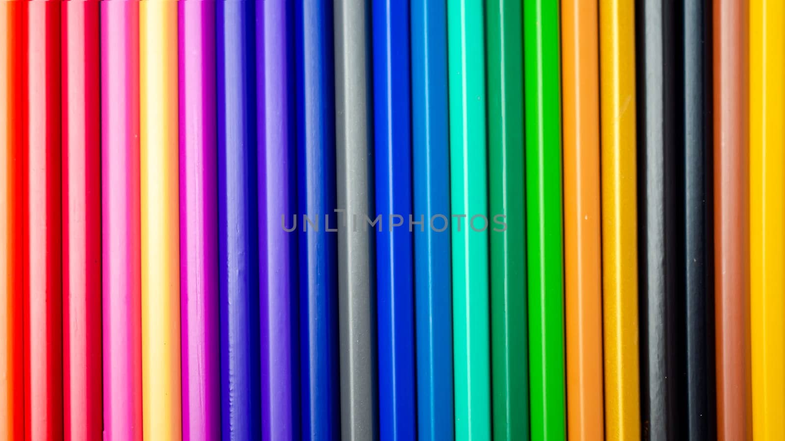 Set of colored pencils on a white background That is arranged in a bar graph, Color pencils on white background, Close up, seamless colored pencils row with wave on lower side, line pencils.