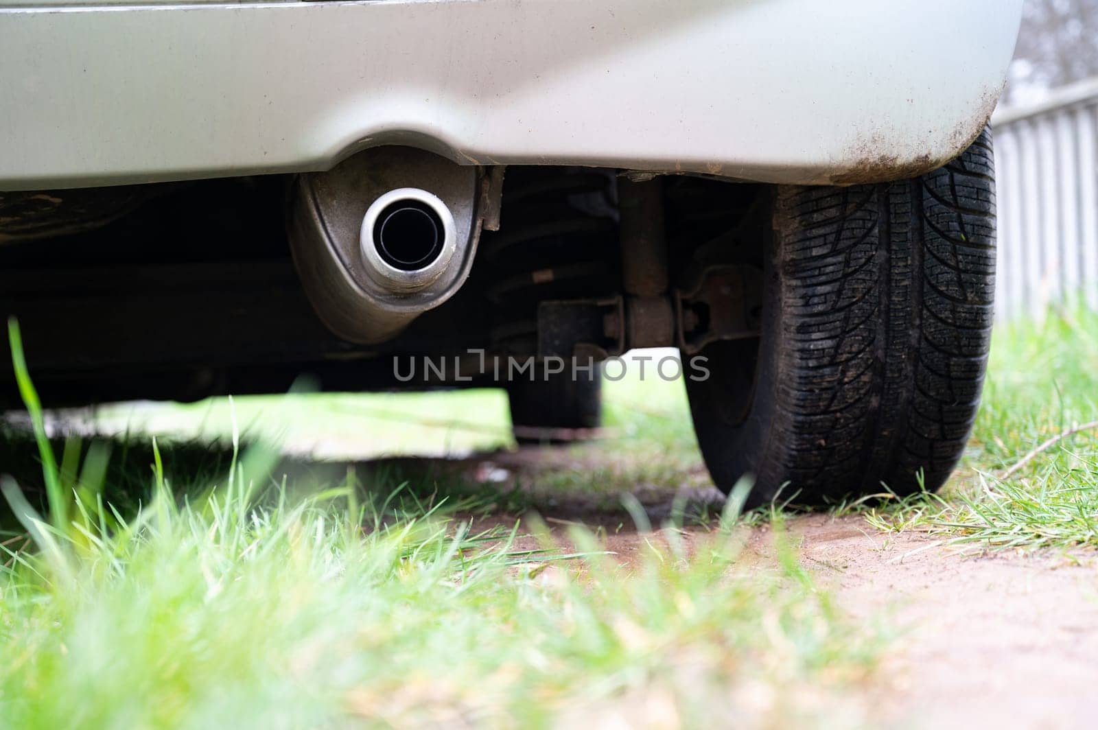 Exhaust of a car, CO2 emission, air pollution, global warming and climate change, reduce carbon footprint, environment protection, lifestyle