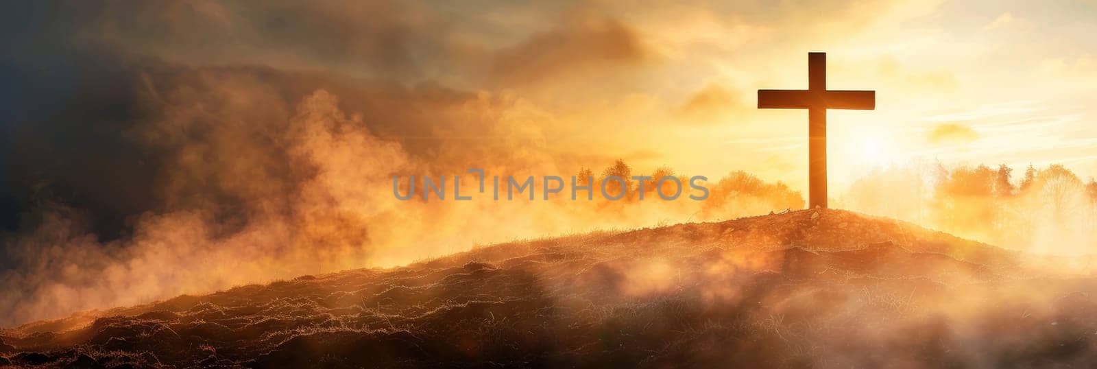 Cross on the hill at sunset with clouds in the sky.