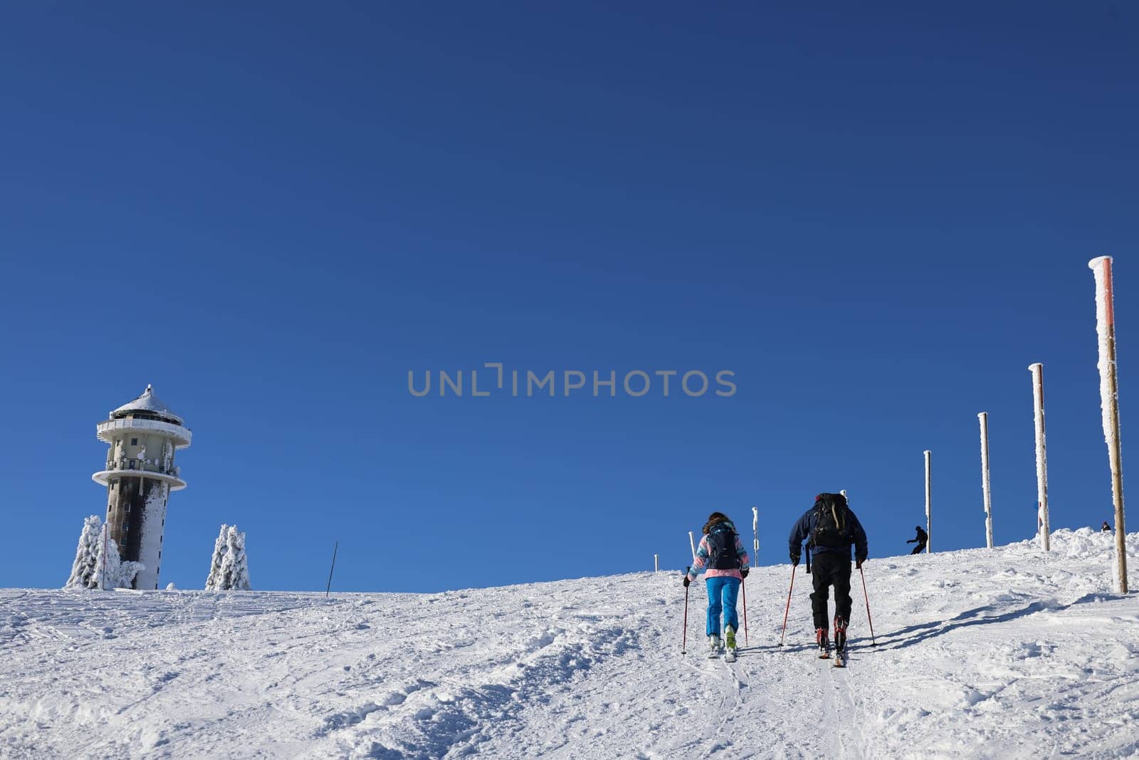Ski tourers on the way to the Feldberg summit at the beginning of winter  In picture-perfect weather with blue skies,pure sunshine and over half a metre of snow,the ski season was opened on the 1,493-metre-high Feldberg (Breisgau-Hochschwarzwald district). Several hundred winter sports enthusiasts frolicked in the snow on skis and snowboards. Others took the opportunity for a first winter walk or a toboggan ride in a dreamlike snow-covered winter landscape on the Höchsten. But in the next few days the weather is expected to become more unstable again