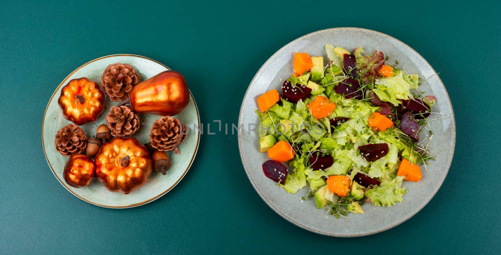 Healthy vegan cuisine, autumn salad of baked pumpkin, beetroot and greens. Vegan food. Top view.