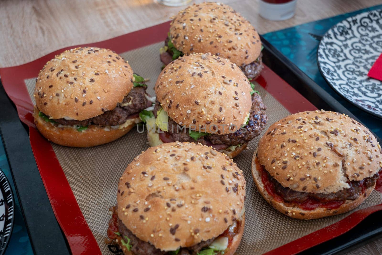 a close up of home made burgers