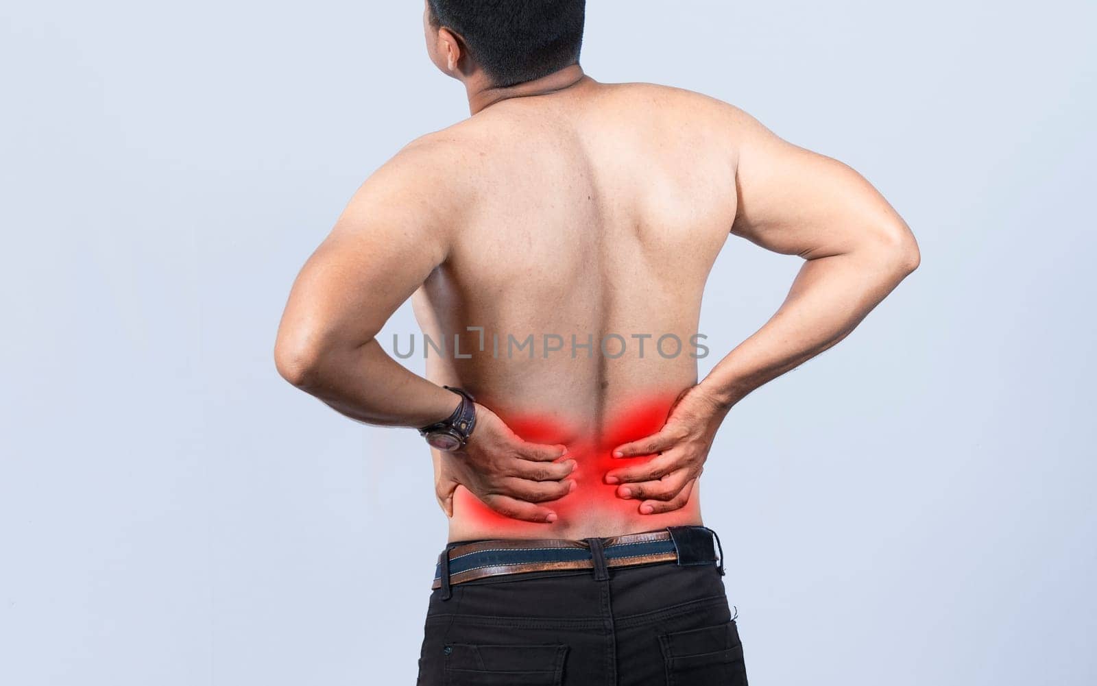 Person with back problems on isolated background, lumbar problems concept, A man with spine problems, a sore person with back pain