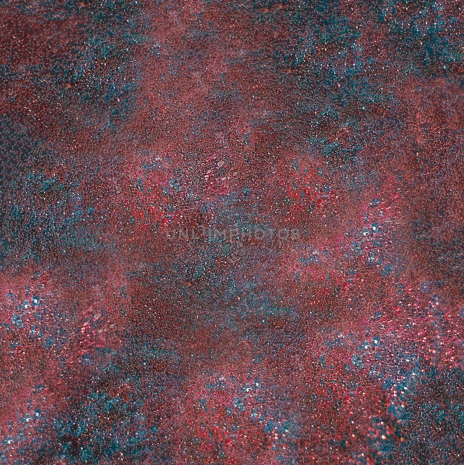 A colorful solid relief mottled surface made of a rough gray base with uneven depressions.Texture or background