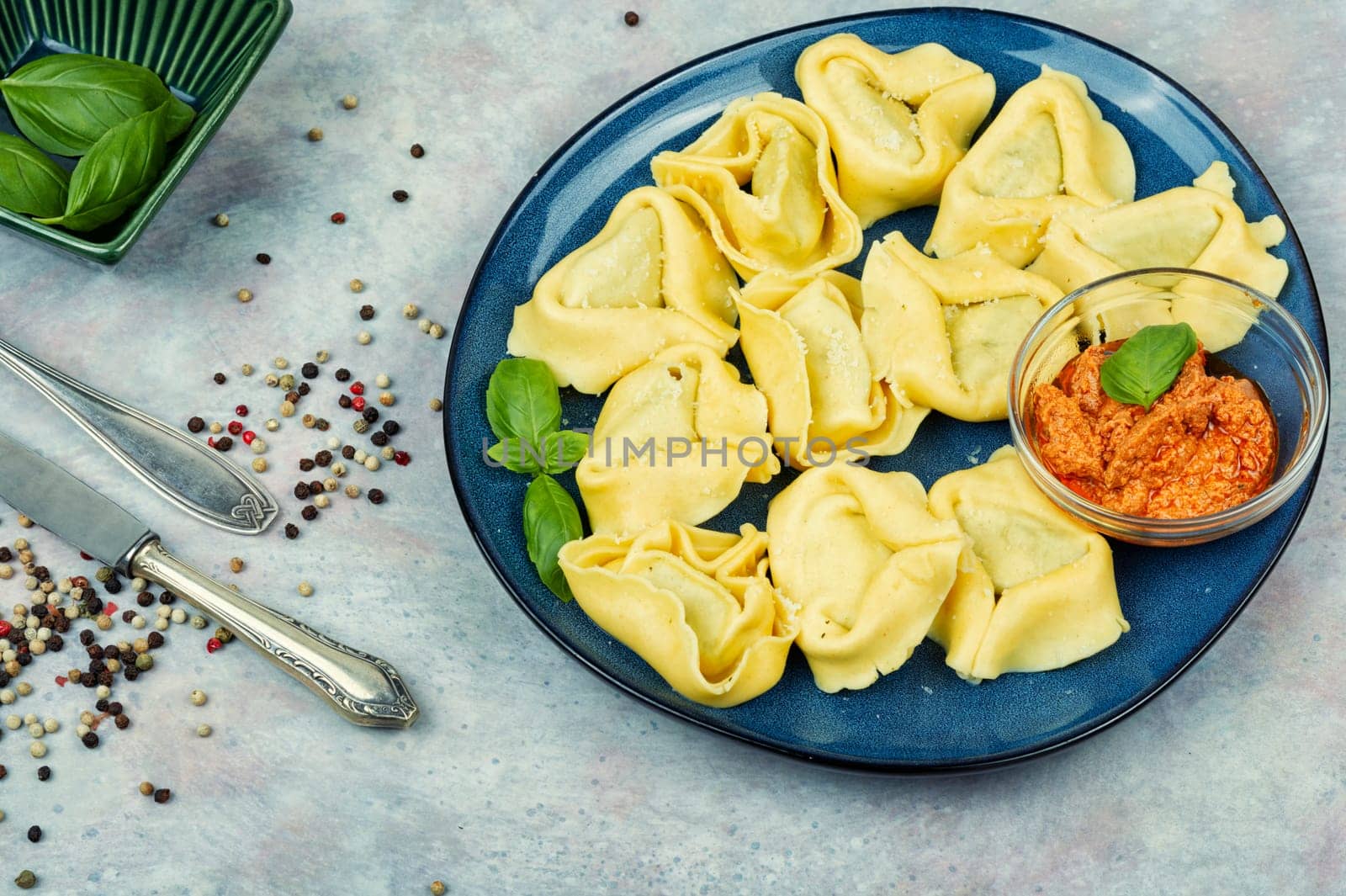 Tortelloni stuffed with ricotta cheese and basil pesto.