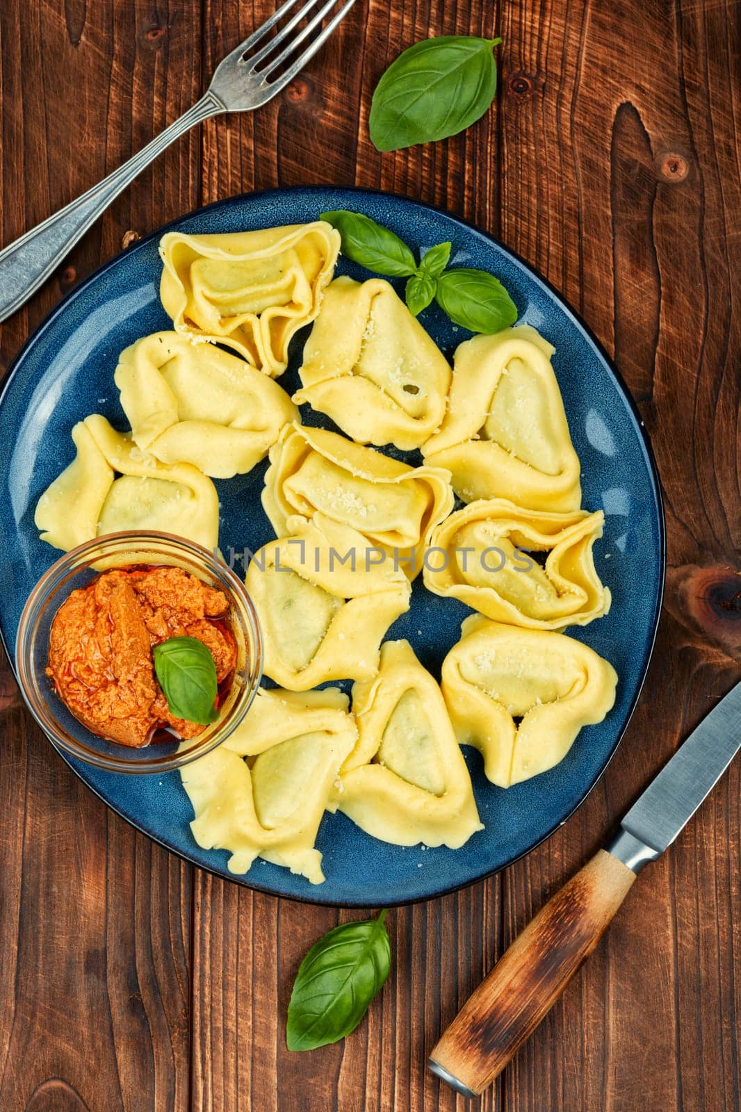 Tortelloni stuffed with ricotta cheese and basil pesto.