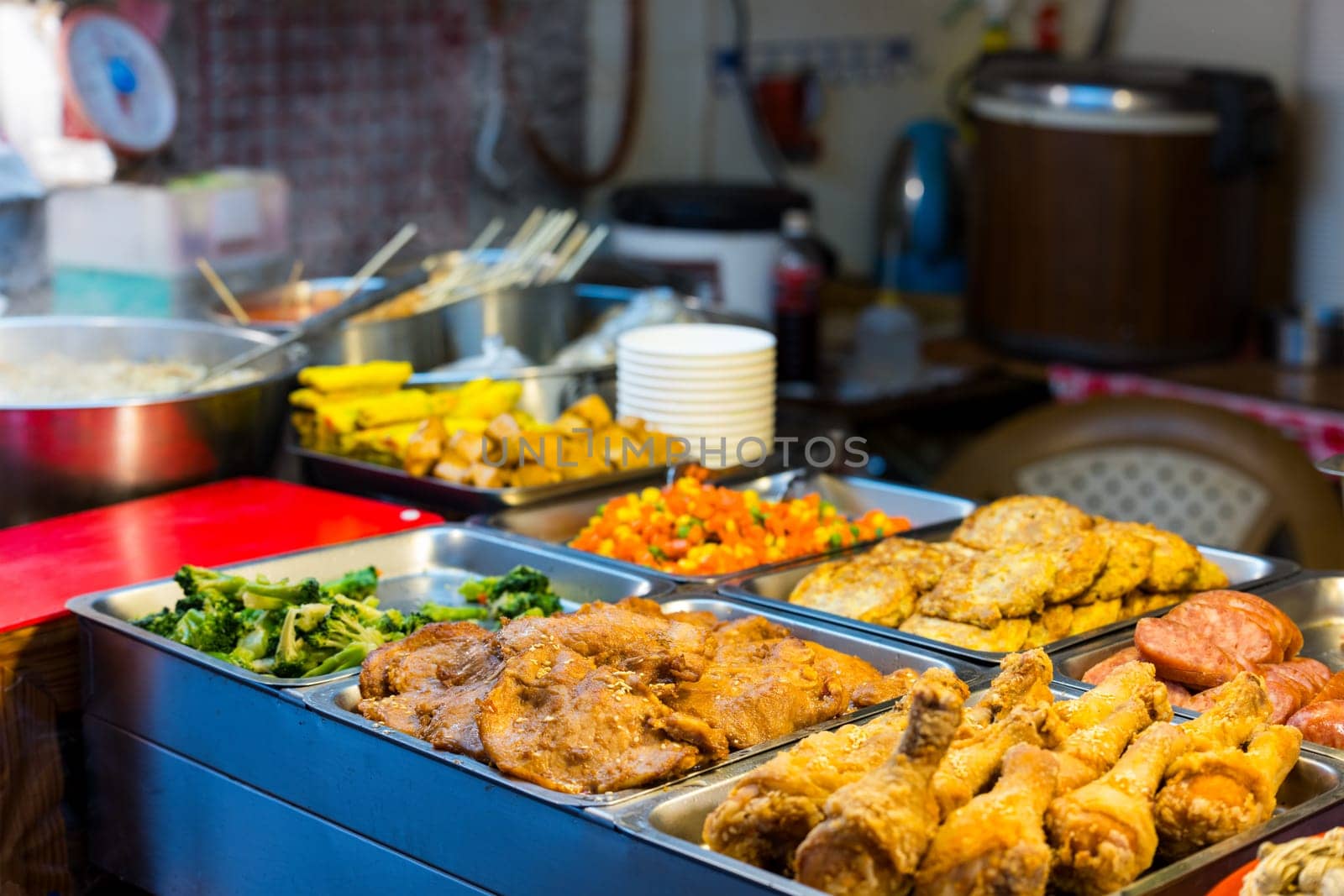 Vendor selling food in the street market
