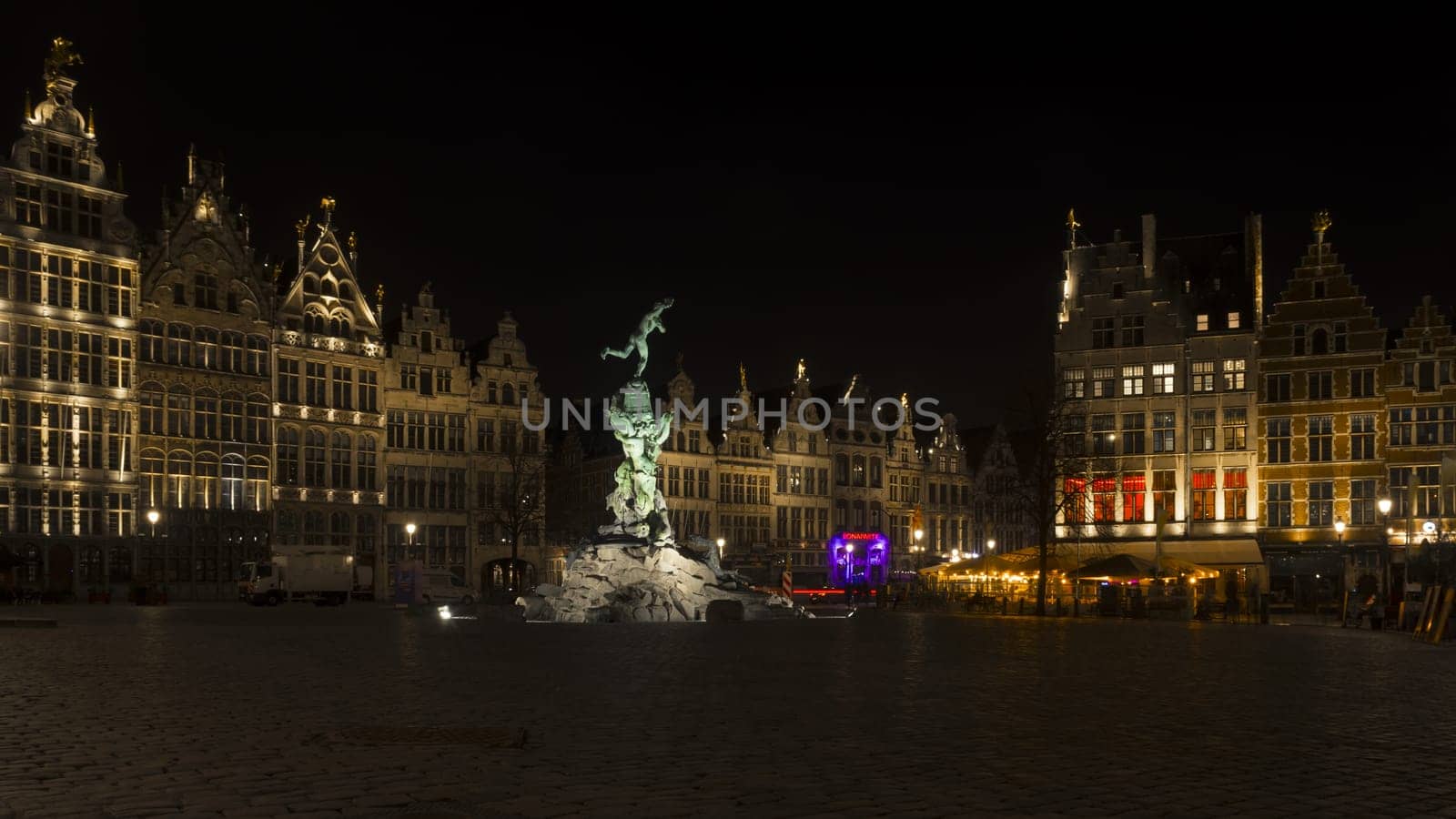 Antwerp, Belgium, March 21st 2024: Night view on Grand Place with Brabo Fountain and historical buildings in Antwerp, Belgium