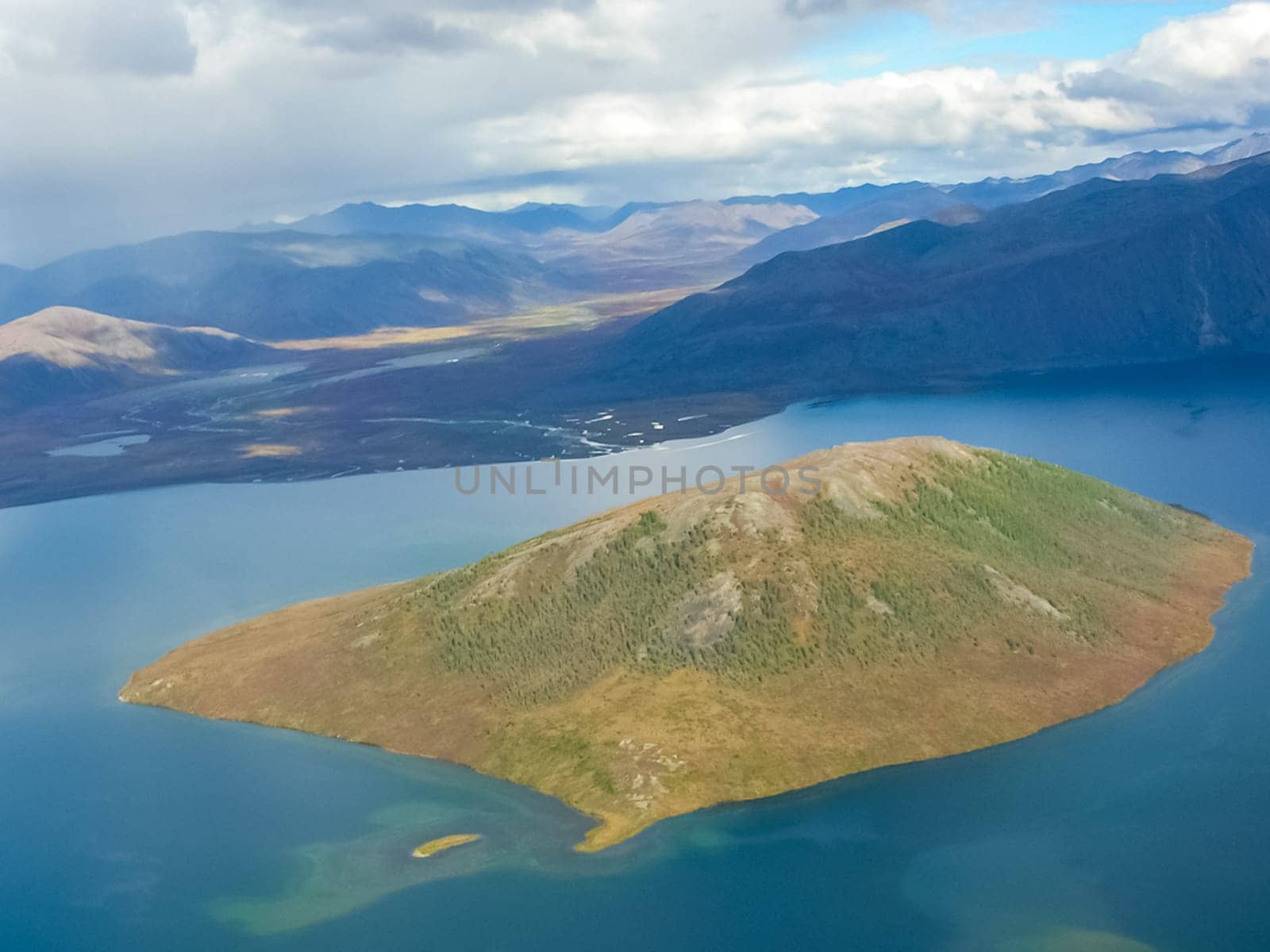 View of the nature and villages of Chukotka from the height of the helicopter.