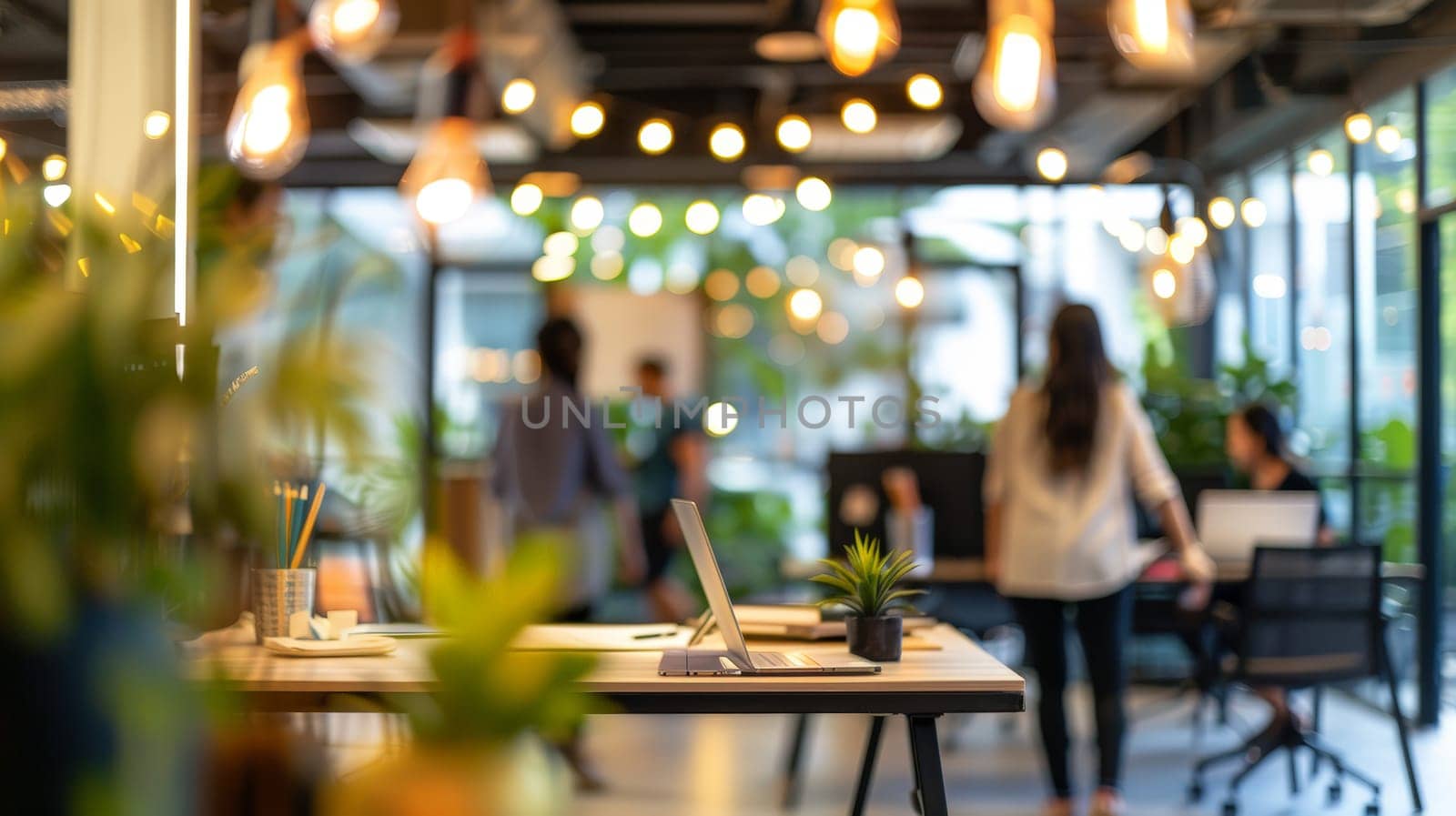In this dynamic business environment, the hustle and bustle of an office come to life with blurred figures in casual attire, creating a sense of movement and activity. The bokeh background adds a touch of vibrancy and energy to the scene.