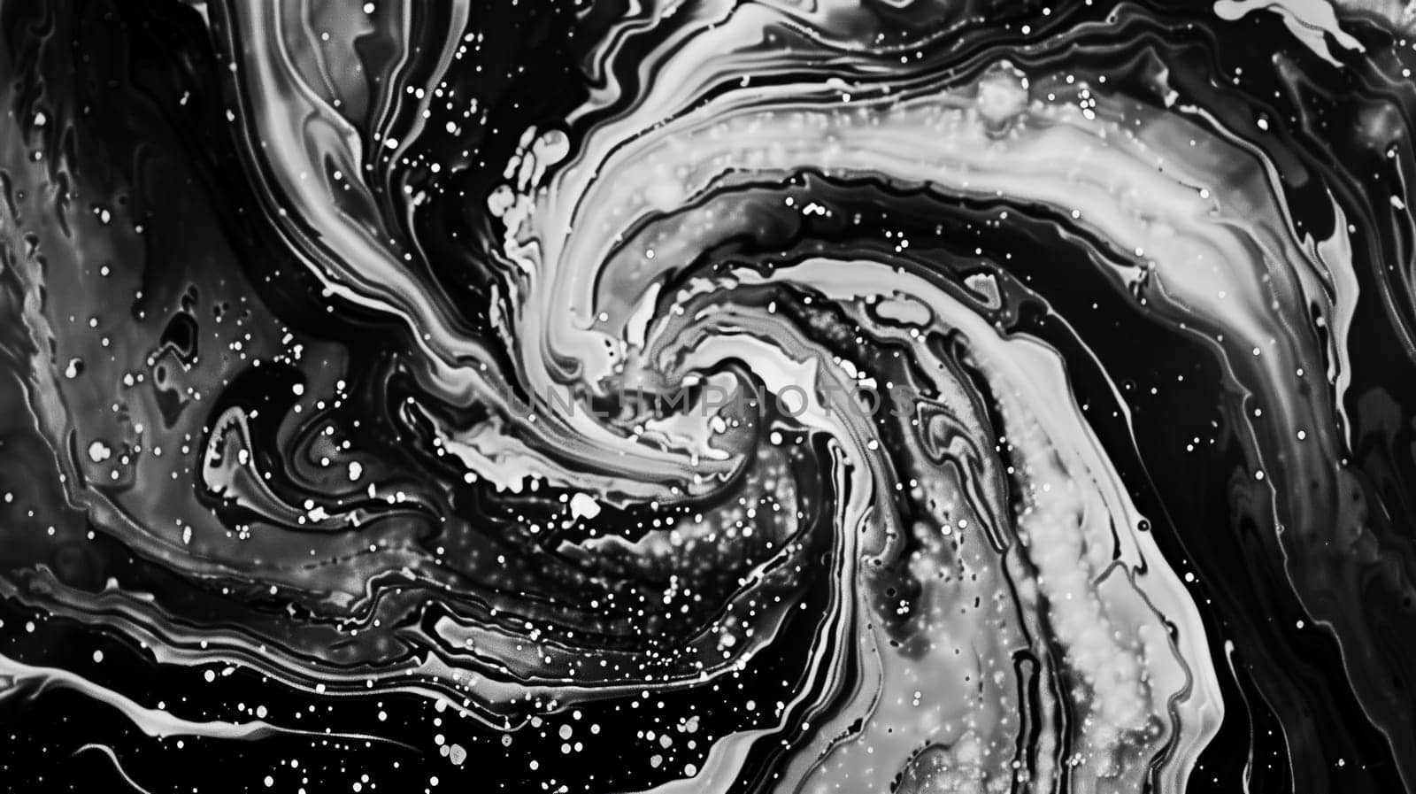 Discover the mesmerizing essence of swirling textures captured in black and white. This abstract composition showcases the dynamic motion of fingers creating intricate patterns, evoking a sense of fluidity and depth.