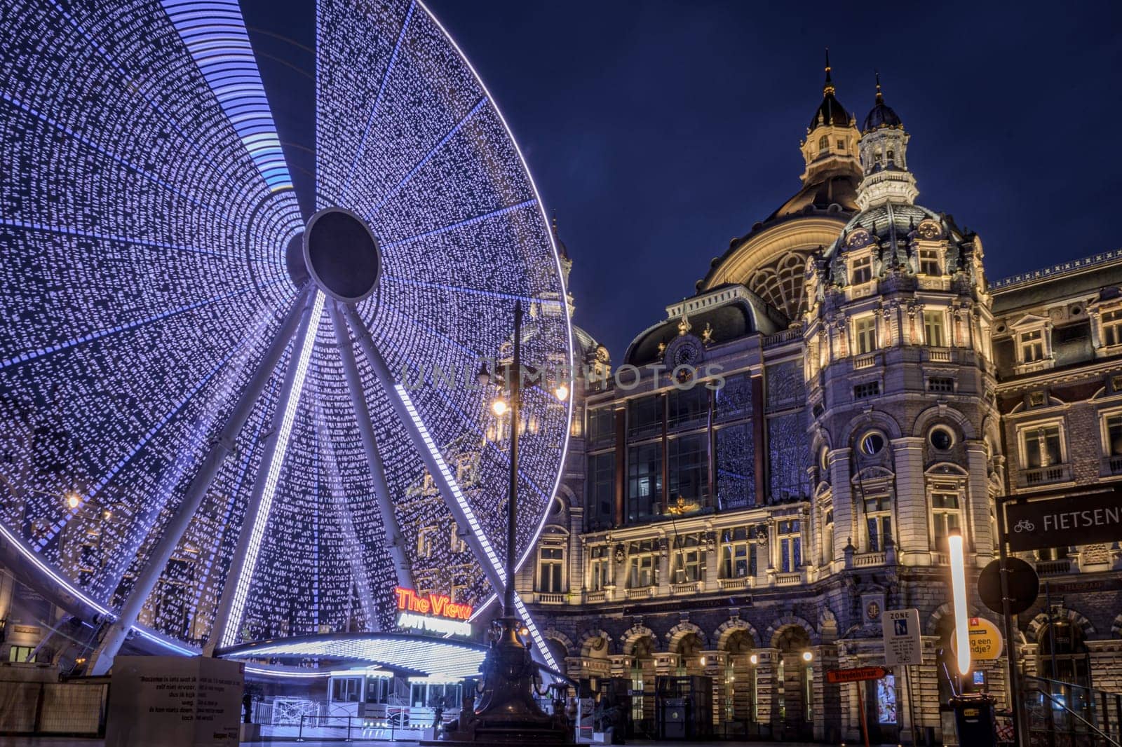 Antwerp, Belgium, March 21st 2024: The View ferris wheel on NMBS Central Railwaystation on Queen Astrid Square in Antwerp.