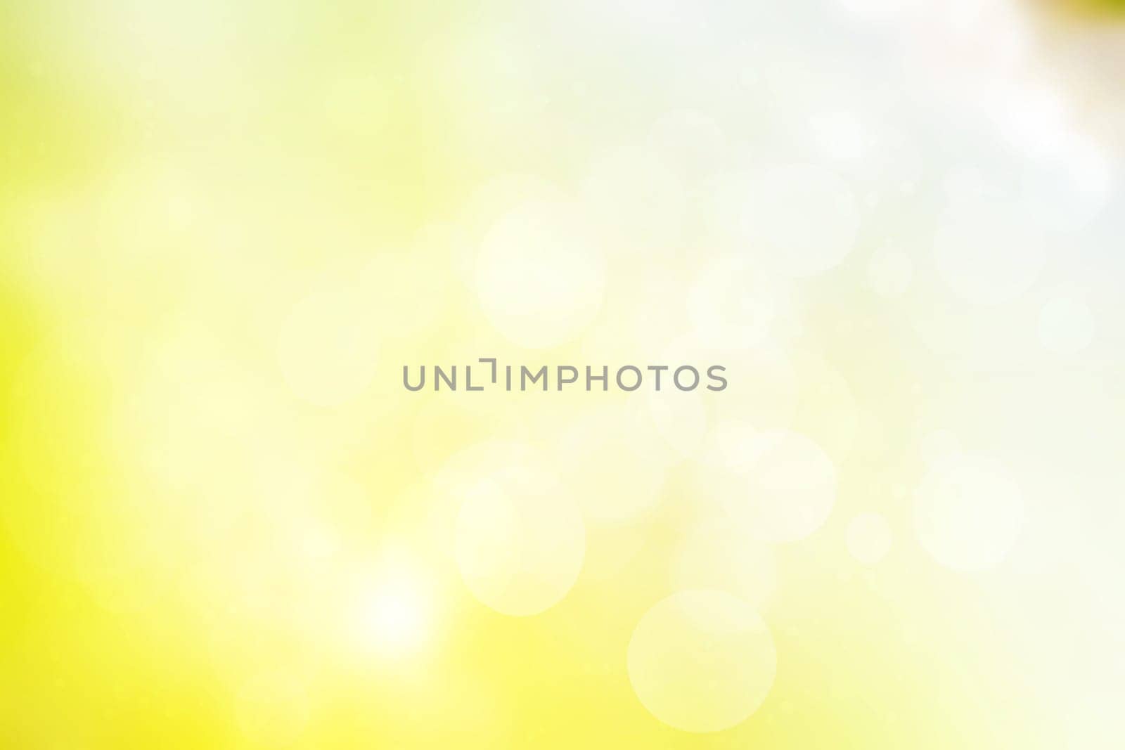 Abstract blurred fresh vivid spring summer light delicate pastel yellow white bokeh background texture with bright circular soft color lights. Beautiful backdrop illustration.