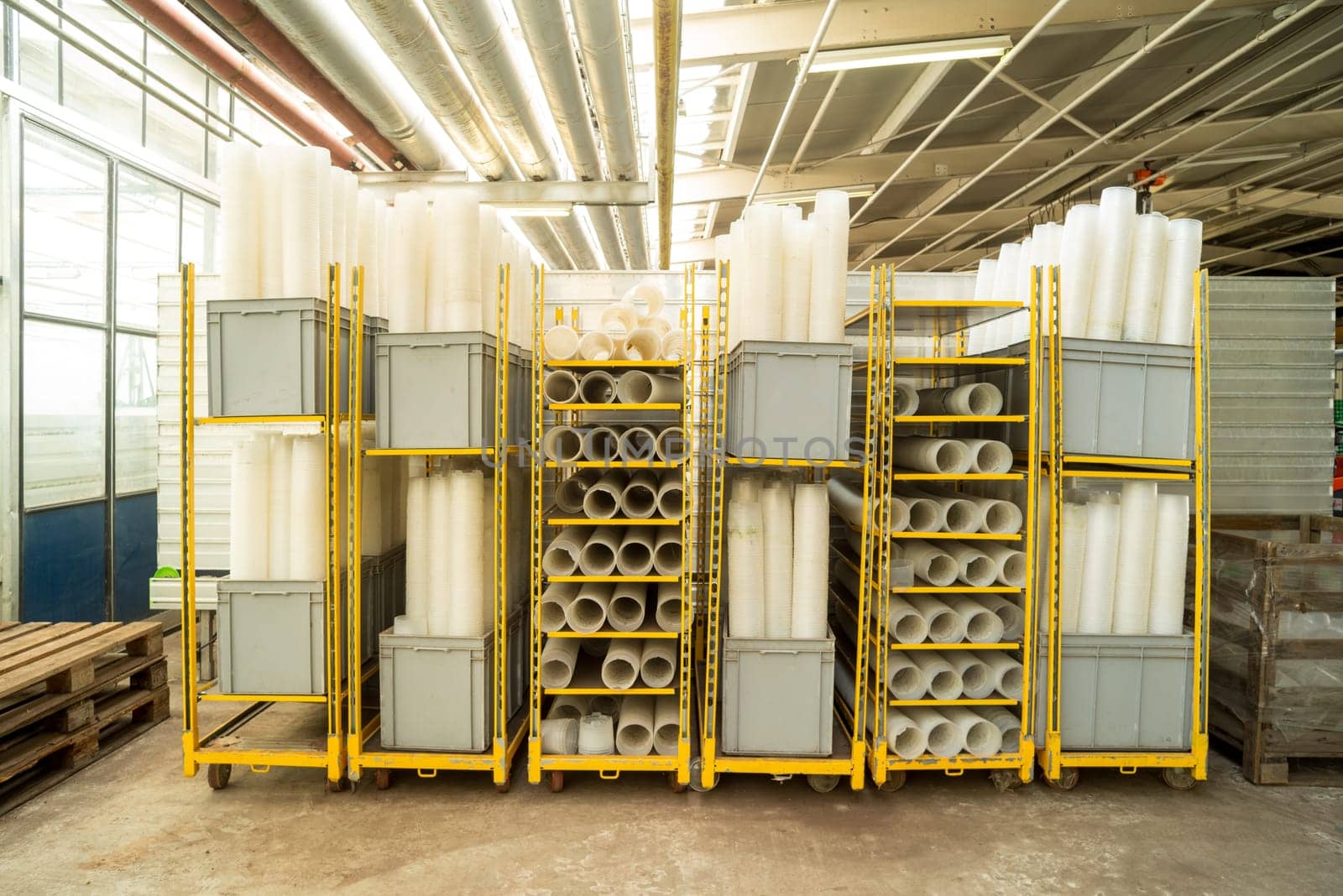 stockpile of trays in a commercial greenhouse