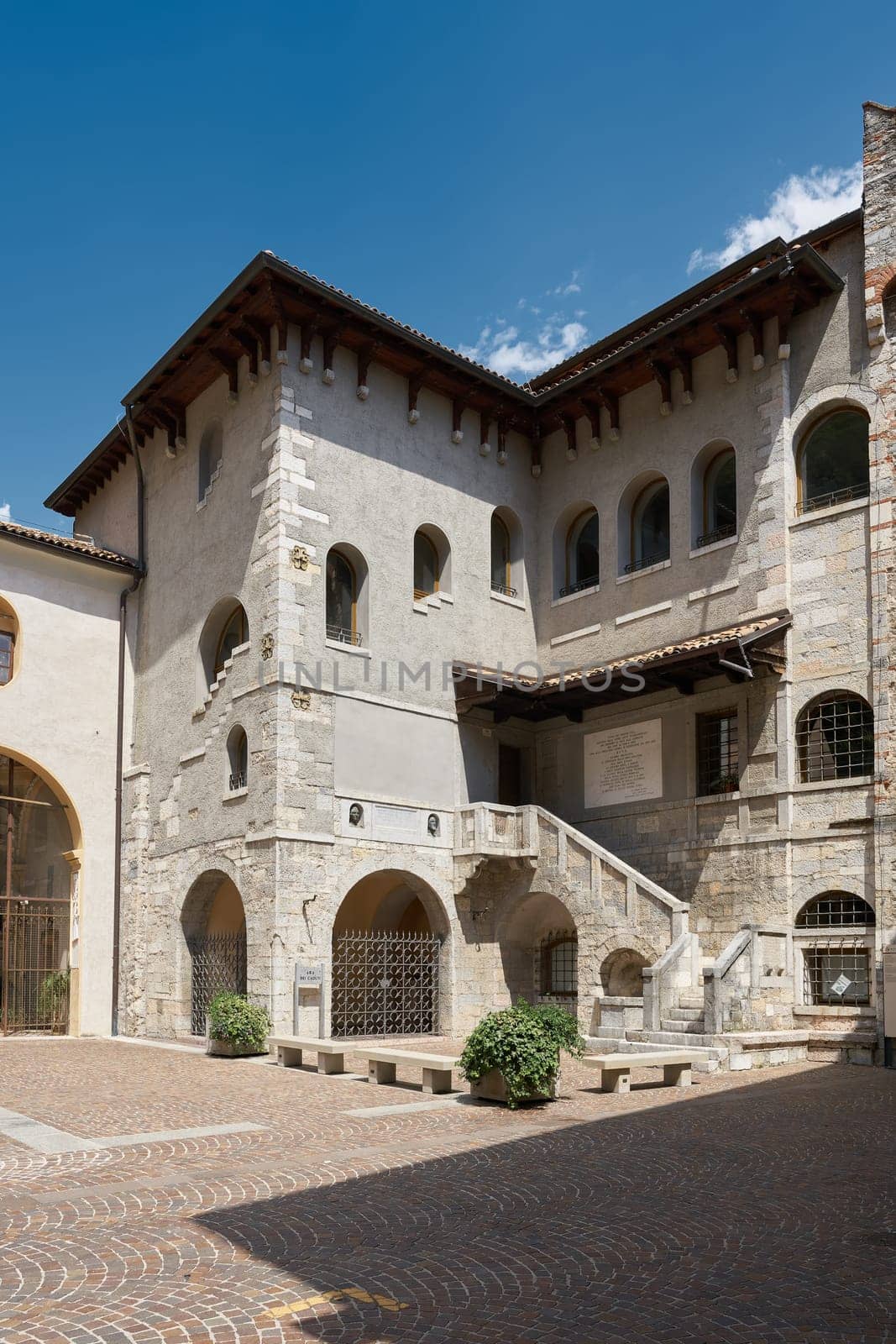 Historic buildings in Piazza San Rocco in the old town of Riva del Garda in Italy